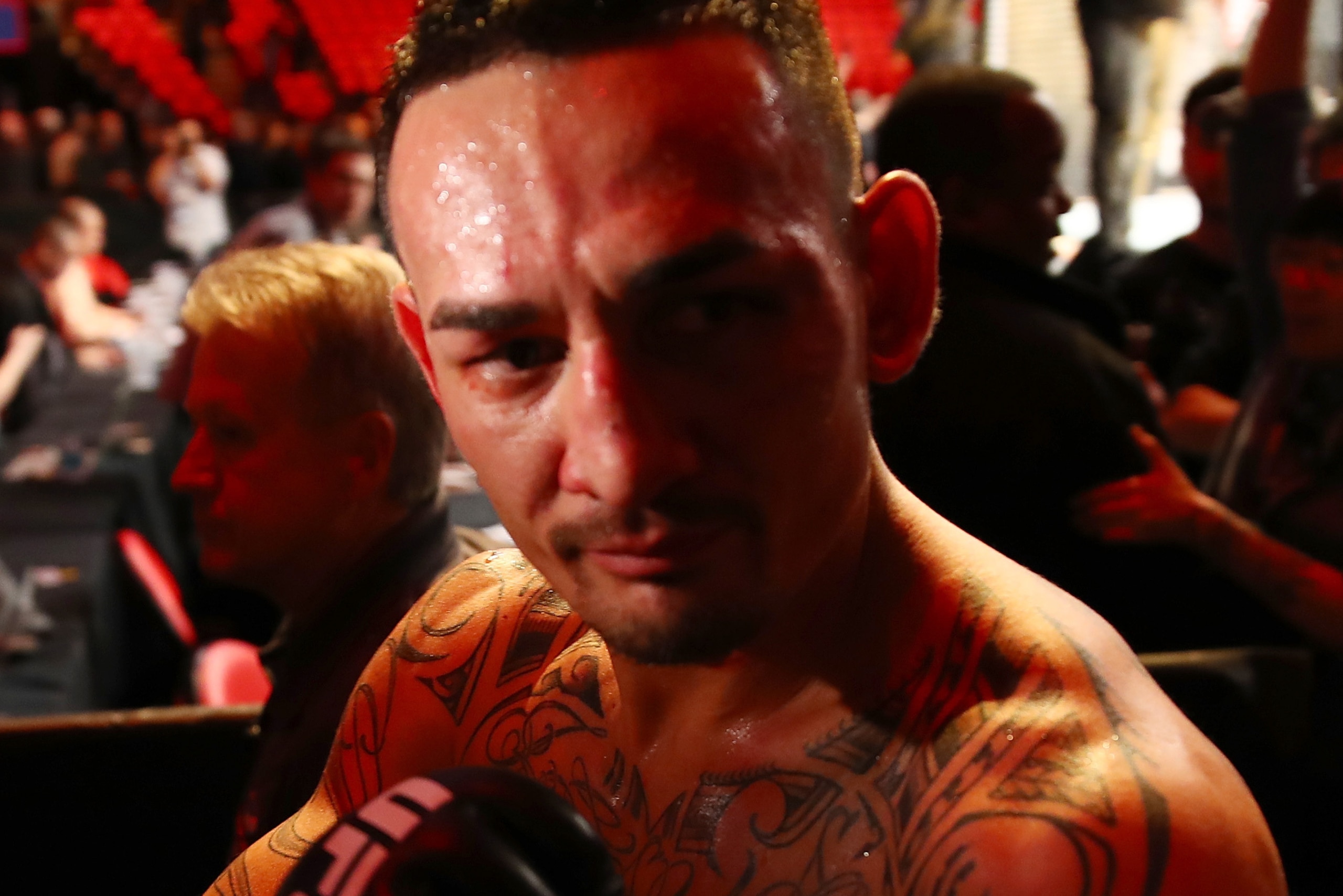 7DETROIT, MI - DECEMBER 02: Max Holloway celebrates his victory over Jose Aldo of Brazil during UFC 218 at Little Caesars Arena on December 2, 2018 in Detroit, Michigan. (Photo by Gregory Shamus/Getty Images)