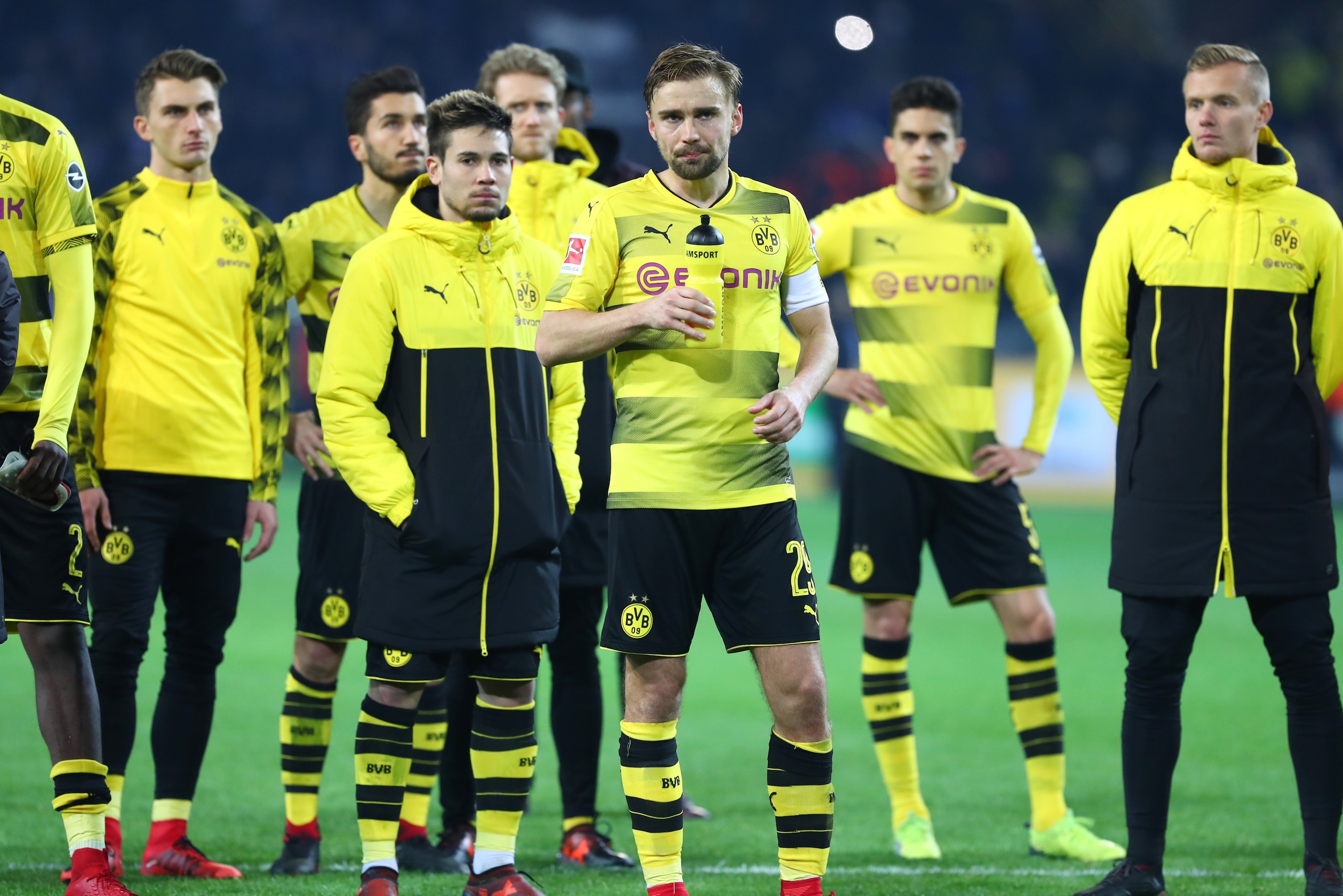 DORTMUND, GERMANY - NOVEMBER 25: Maximilian Philipp of Dortmund , Nuri Sahin of Dortmund , Raphael Guerreiro of Dortmund , Andre Schuerrle of Dortmund , Marcel Schmelzer of Dortmund , Marc Bartra of Dortmund and Dominik Reimann of Dortmund looks dejected DORTMUND, GERMANY - NOVEMBER 25: Maximilian Philipp of Dortmund , Nuri Sahin of Dortmund , Raphael Guerreiro of Dortmund , Andre Schuerrle of Dortmund , Marcel Schmelzer of Dortmund , Marc Bartra of Dortmund and Dominik Reimann of Dortmund looks dejected