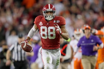 TAMPA, FL - JANUARY 09:  Tight end O.J. Howard #88 of the Alabama Crimson Tide runs to the end zone after making a 68-yard touchdown reception during the third quarter against the Clemson Tigers in the 2017 College Football Playoff National Championship G