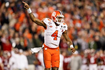 TAMPA, FL - JANUARY 09: Quarterback Deshaun Watson #4 of the Clemson Tigers celebrates after a touchdown during the 2017 College Football Playoff National Championship Game against the Alabama Crimson Tide at Raymond James Stadium on January 9, 2017 in Ta