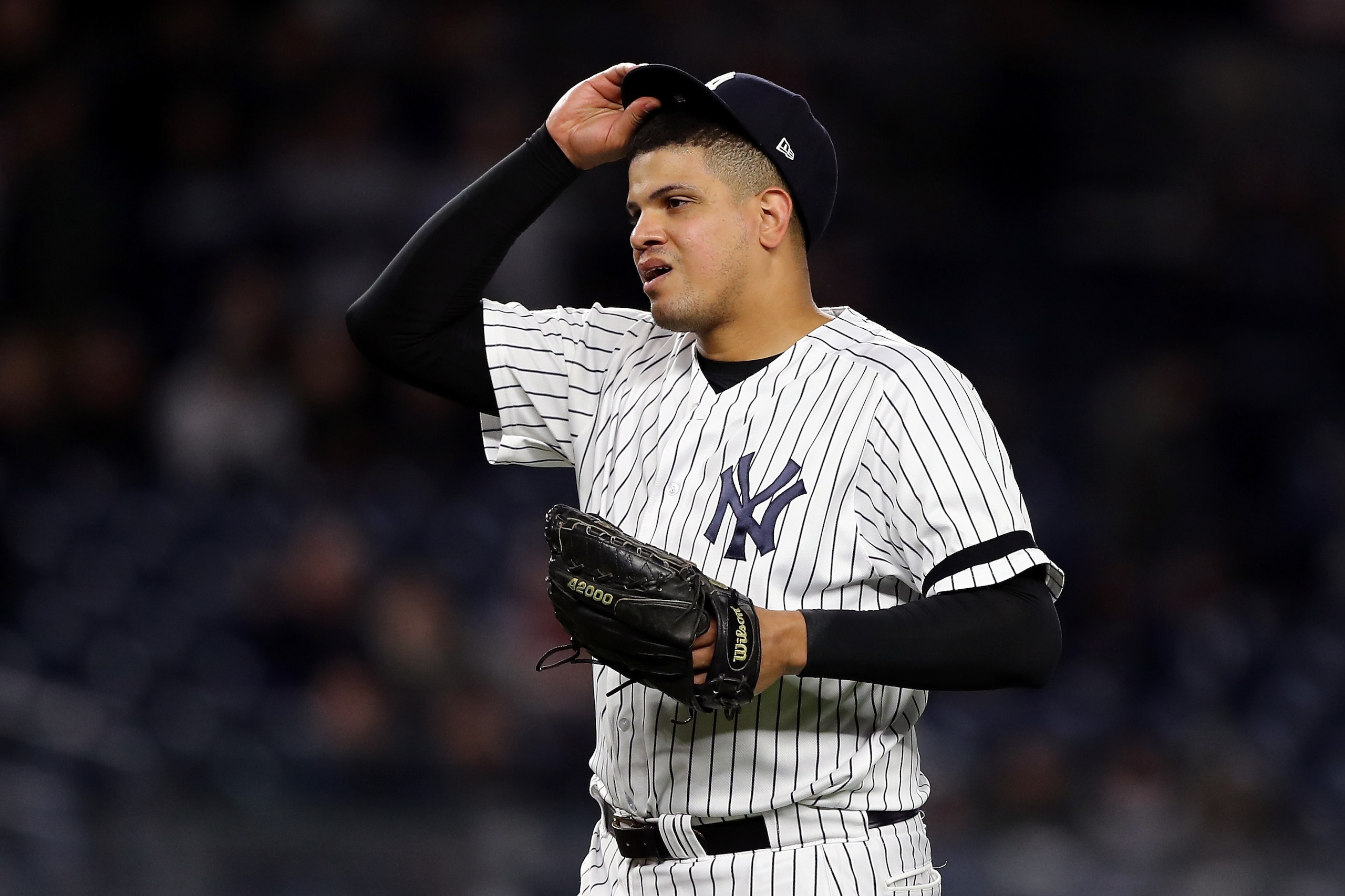 NEW YORK, NY - OCTOBER 16: Dellin Betances #68 of the New York Yankees reacts as he is pulled from the game after walking the first two batters of the ninth inning against the Houston Astros in Game Three of the American League Championship Series at Yank NEW YORK, NY - OCTOBER 16: Dellin Betances #68 of the New York Yankees reacts as he is pulled from the game after walking the first two batters of the ninth inning against the Houston Astros in Game Three of the American League Championship Series at Yank