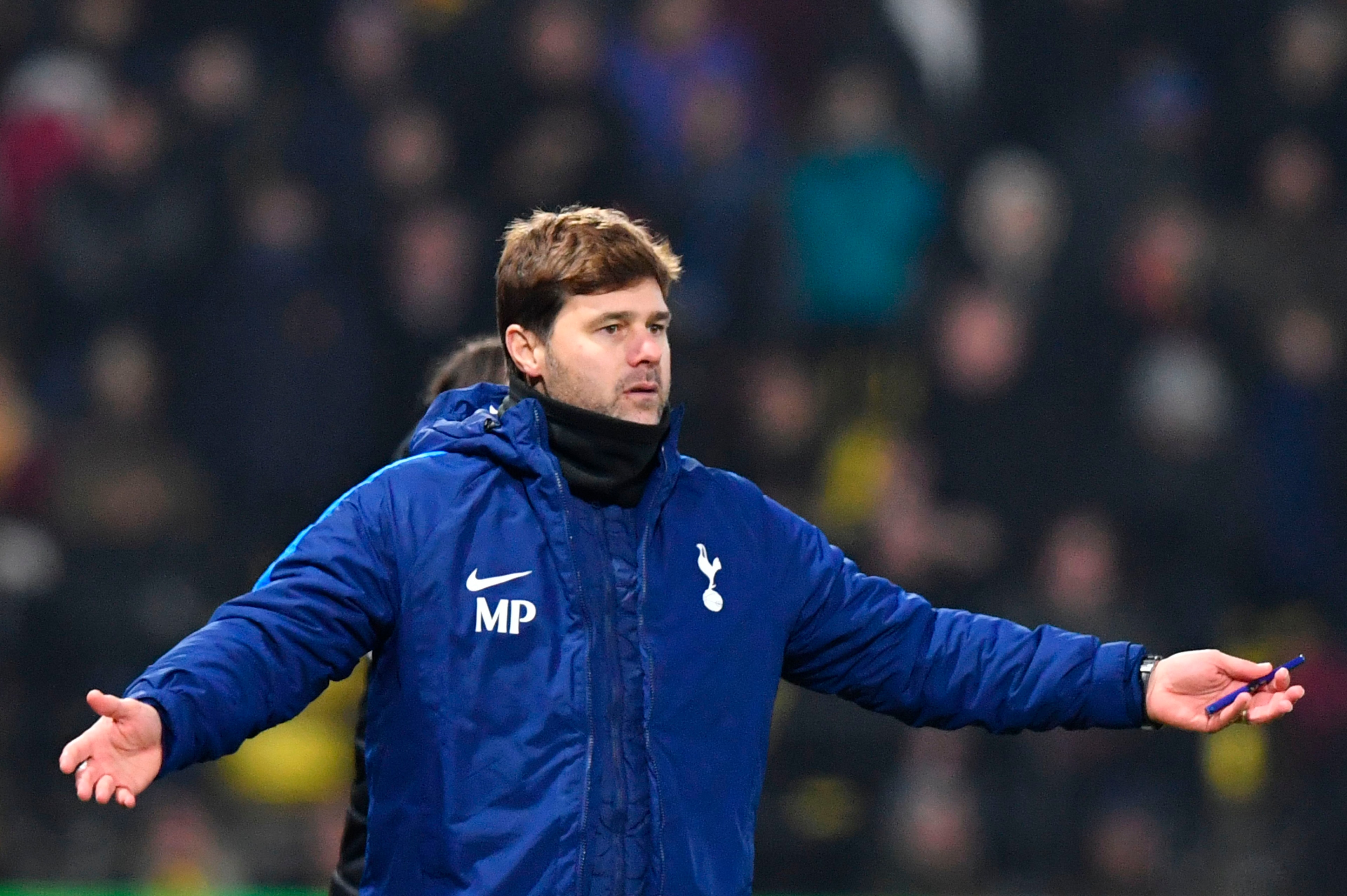 Tottenham Hotspur's Argentinian head coach Mauricio Pochettino reacts on the touchline during the English Premier League football match between Watford and Tottenham Hotspur at Vicarage Road Stadium in Watford, north of London on December 2, 2017. / AFP P