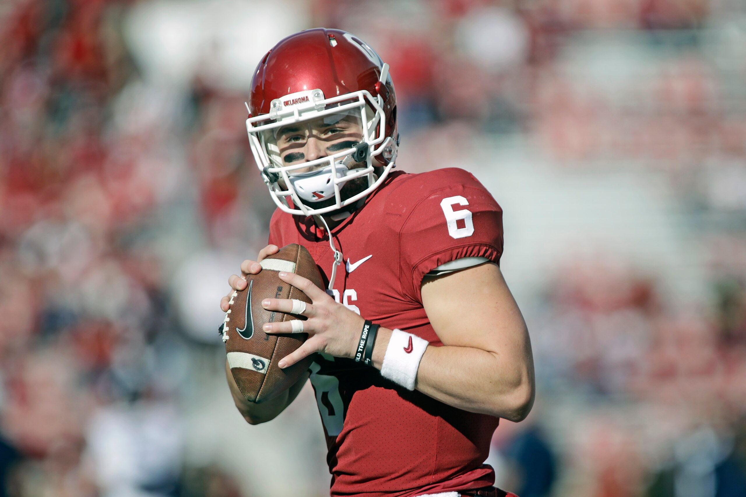 NORMAN, OK - NOVEMBER 25: Quarterback Baker Mayfield #6 of the Oklahoma Sooners warms up before the game against the West Virginia Mountaineers at Gaylord Family Oklahoma Memorial Stadium on November 25, 2017 in Norman, Oklahoma. Oklahoma defeated West Vi