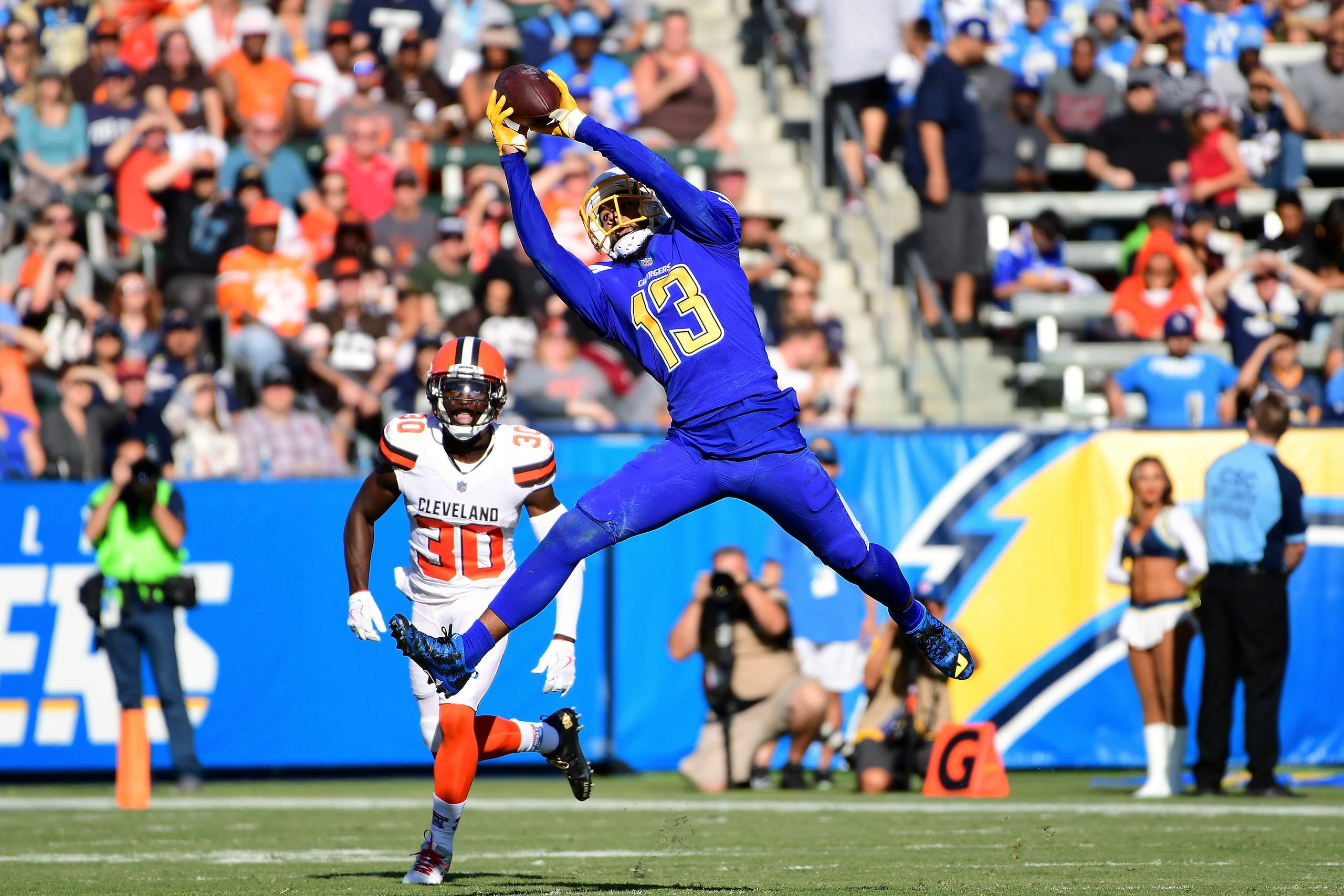 CARSON, CA - DECEMBER 03:  Keenan Allen #13 of the Los Angeles Chargers matches the catch in front Jason McCourty #30 of the Cleveland Browns for a first down during the second quarter of the game at StubHub Center on December 3, 2017 in Carson, Californi