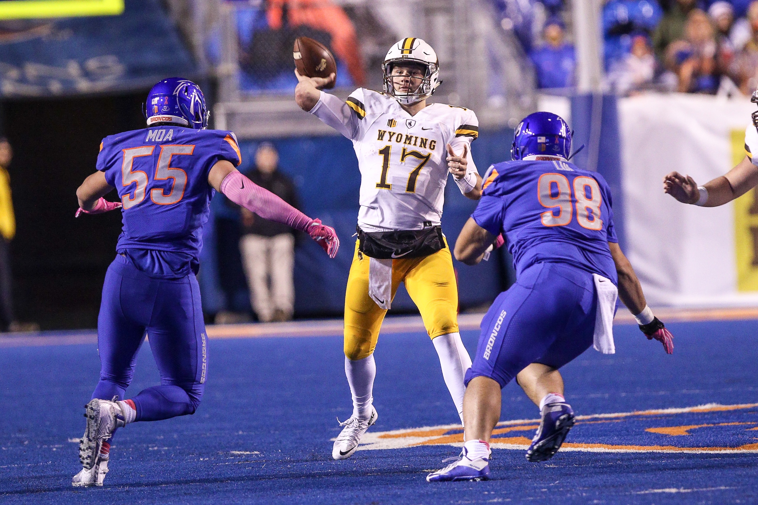 BOISE, ID - OCTOBER 21: Quarterback Josh Allen #17 of the Wyoming Cowboys gets a pass off during first half action against the Boise State Broncos on October 21, 2017 at Albertsons Stadium in Boise, Idaho. (Photo by Loren Orr/Getty Images)