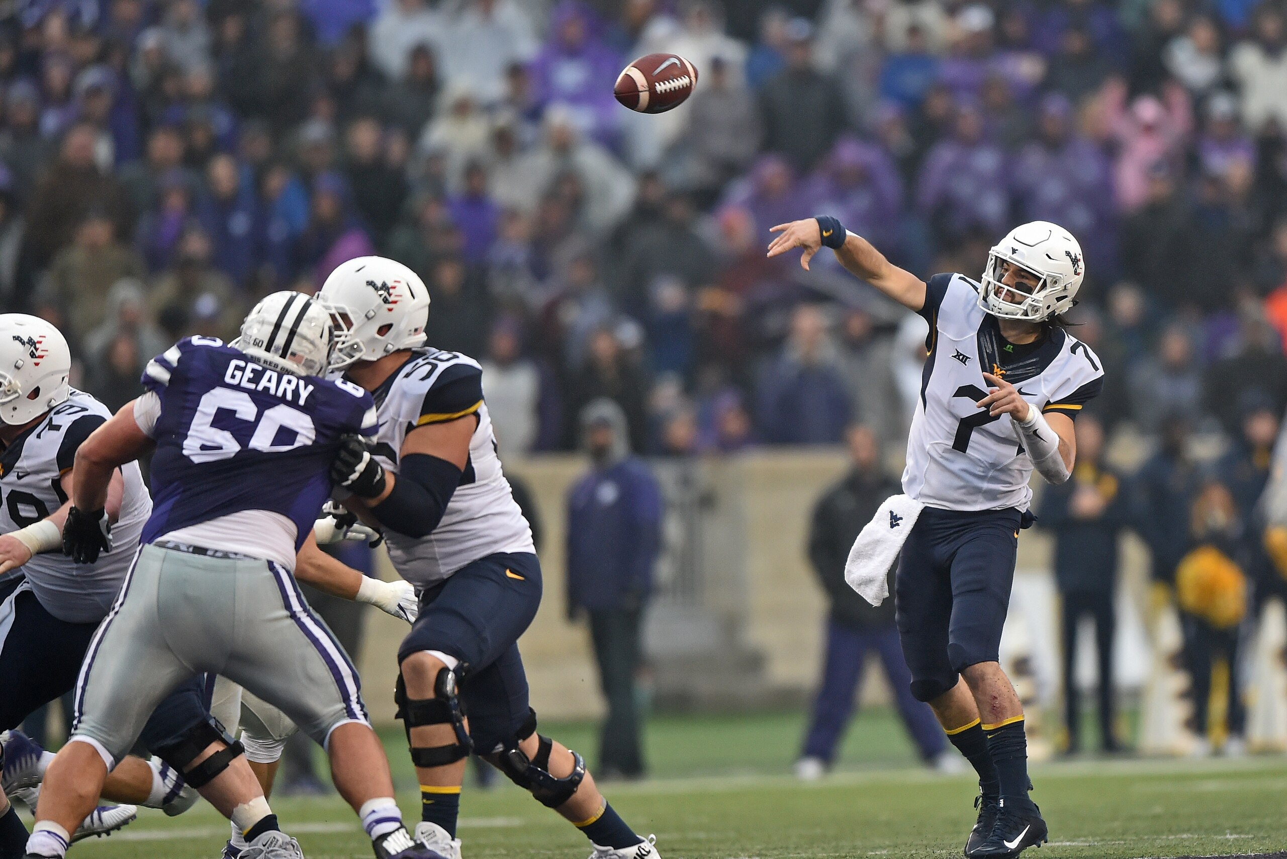 MANHATTAN, KS - NOVEMBER 11:  Quarterback Will Grier #7 of the West Virginia Mountaineers throws a pass against the Kansas State Wildcats during the first half on November 11, 2017 at Bill Snyder Family Stadium in Manhattan, Kansas.  (Photo by Peter G. Ai