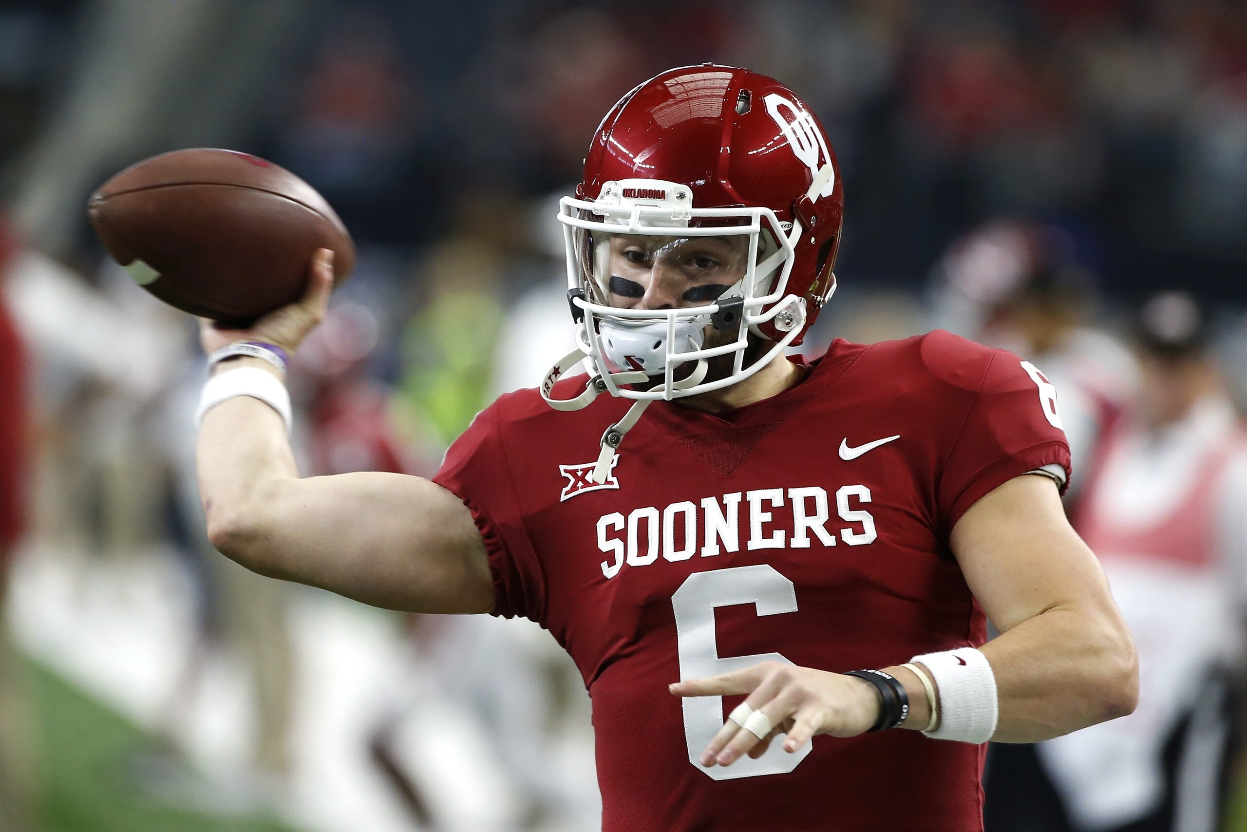 ARLINGTON, TX - DECEMBER 2: Baker Mayfield #6 of the Oklahoma Sooners throws during warmups before taking on the TCU Horned Frogs in the Big 12 Championship at AT&T Stadium on December 2, 2017 in Arlington, Texas. (Photo by Ron Jenkins/Getty Images) ARLINGTON, TX - DECEMBER 2: Baker Mayfield #6 of the Oklahoma Sooners throws during warmups before taking on the TCU Horned Frogs in the Big 12 Championship at AT&T Stadium on December 2, 2017 in Arlington, Texas. (Photo by Ron Jenkins/Getty Images)
