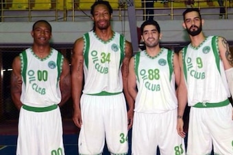 Demario Mayfield (left) with Albert Jackson and other teammates.