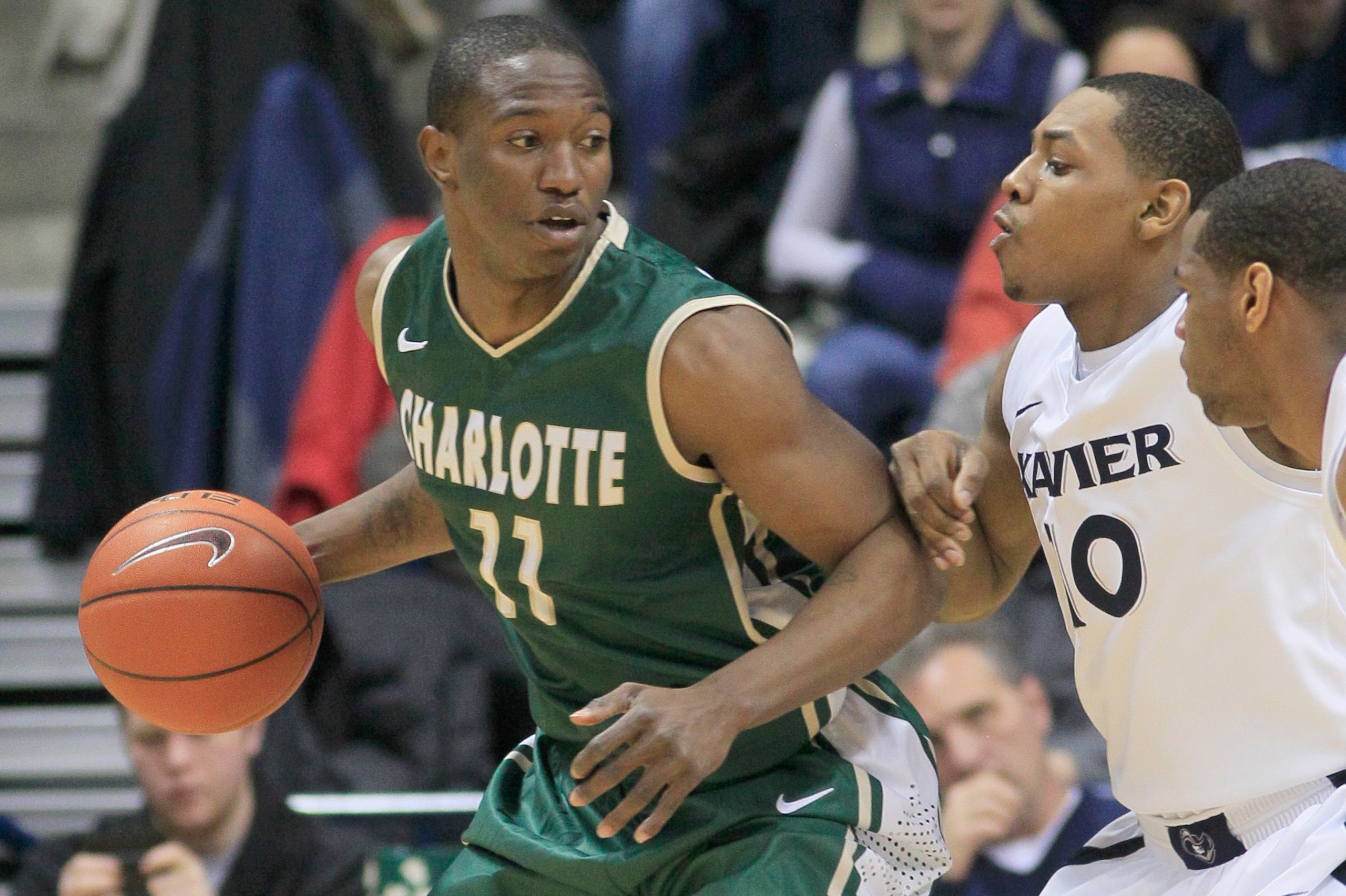 Demario Mayfield backs down an Xavier player. Demario Mayfield backs down an Xavier player.