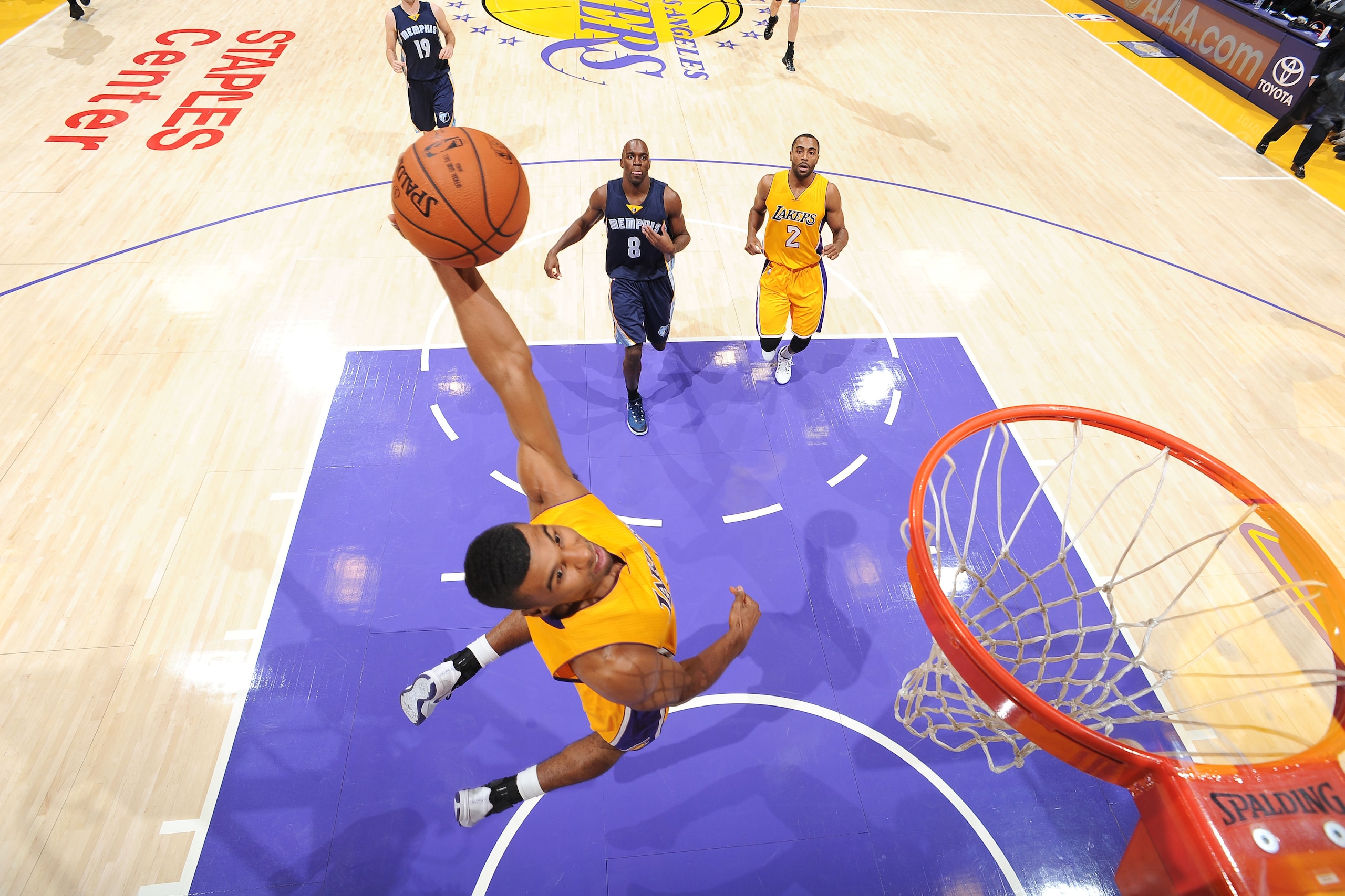 LOS ANGELES, CA - NOVEMBER 26: Ronnie Price #9 of the Los Angeles Lakers dunks against the Memphis Grizzlies at STAPLES Center on November 26, 2014 in Los Angeles, California. NOTE TO USER: User expressly acknowledges and agrees that, by downloading and/o