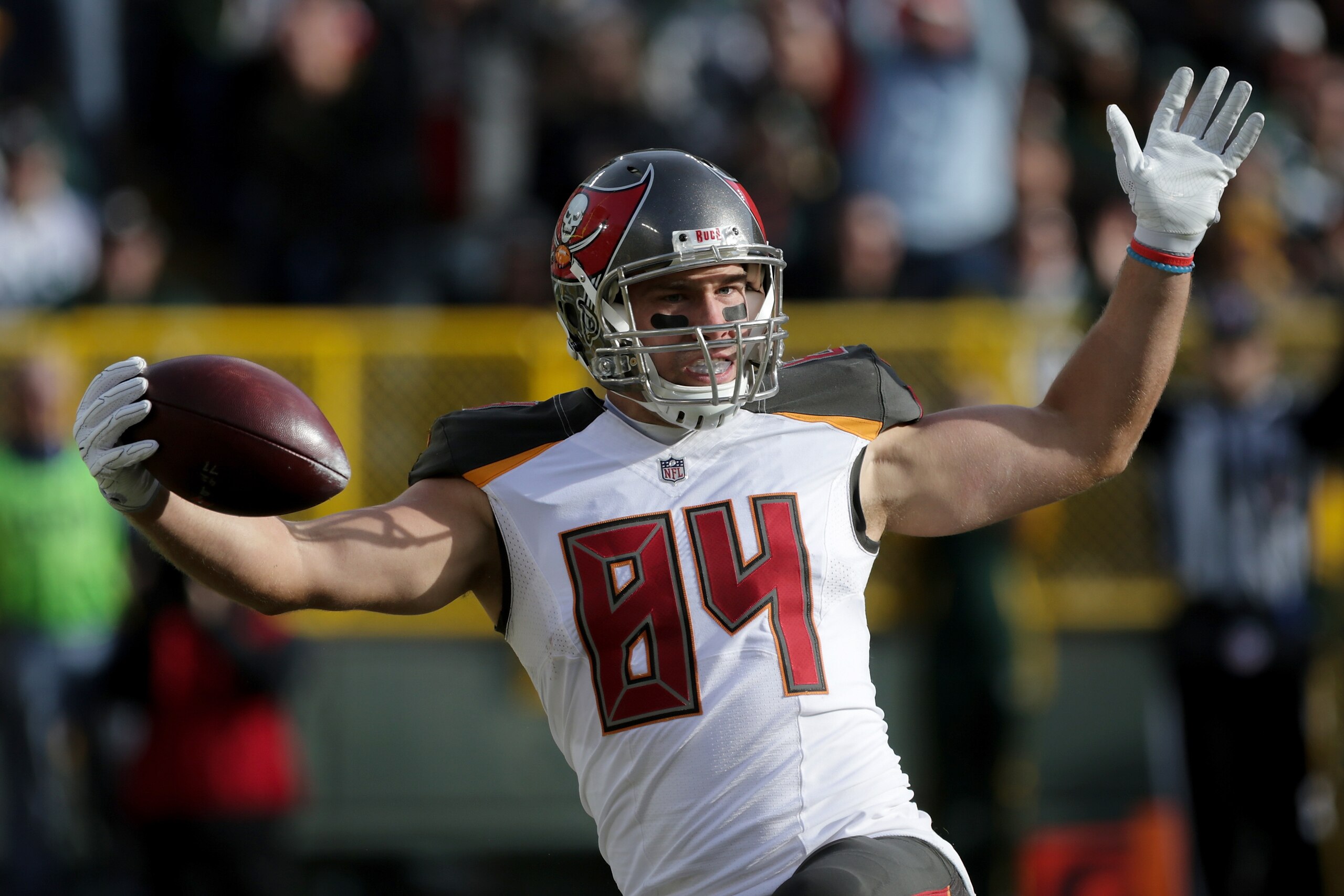 GREEN BAY, WI - DECEMBER 03:  Cameron Brate #84 of the Tampa Bay Buccaneers reacts after scoring a touchdown in the first quarter against the Green Bay Packers at Lambeau Field on December 3, 2017 in Green Bay, Wisconsin. (Photo by Dylan Buell/Getty Image