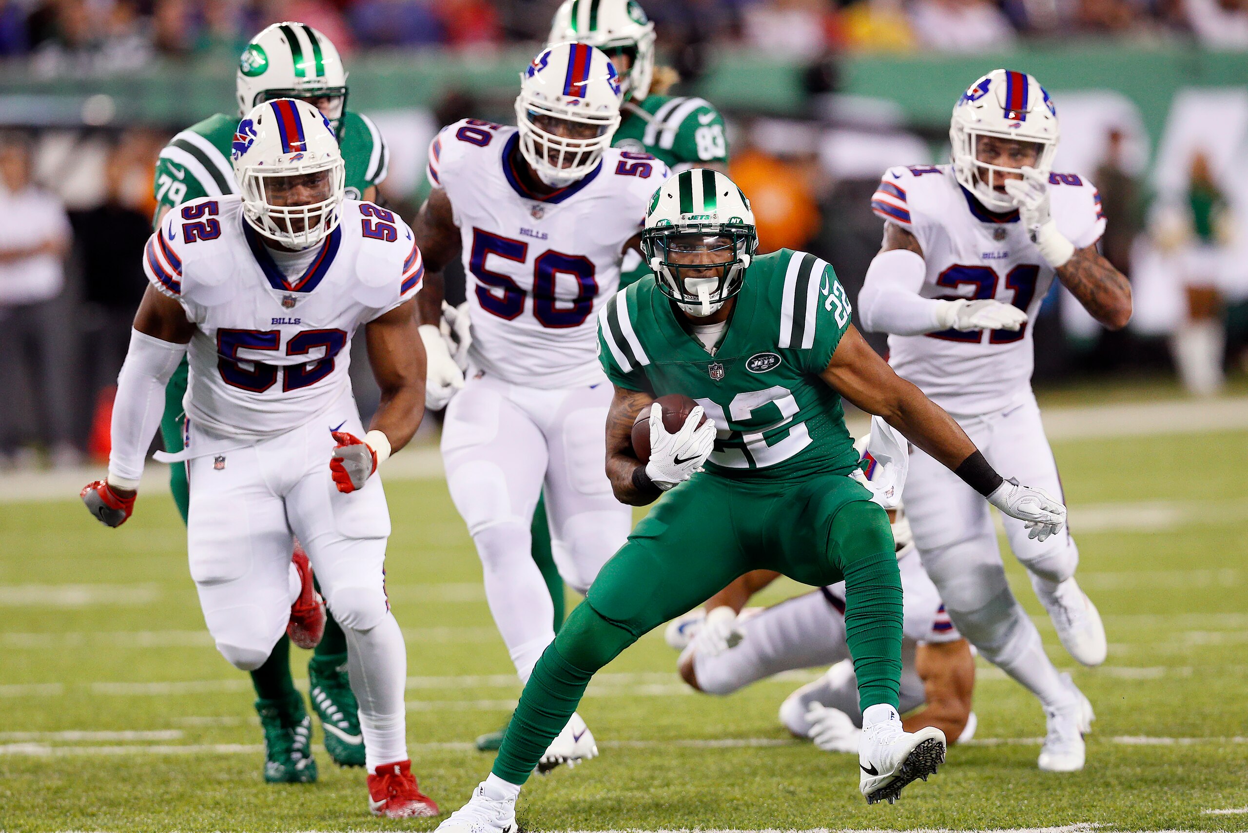 NEW YORK, NY - NOVEMBER 2: Matt Forte #22 of the New York Jets breaks free from Buffalo Bills defenders for a gain in the first half of an NFL football game on November 2, 2017 at MetLife Stadium in East Rutherford, New Jersey. Jets won 34-21. (Photo by NEW YORK, NY - NOVEMBER 2: Matt Forte #22 of the New York Jets breaks free from Buffalo Bills defenders for a gain in the first half of an NFL football game on November 2, 2017 at MetLife Stadium in East Rutherford, New Jersey. Jets won 34-21. (Photo by