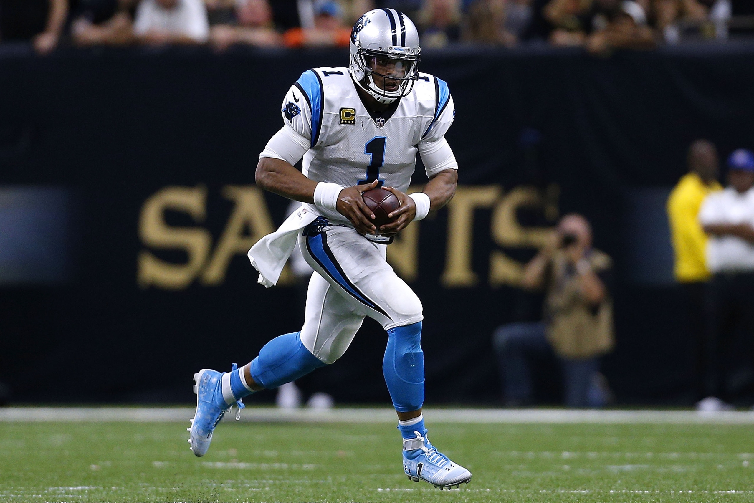 NEW ORLEANS, LA - DECEMBER 03:  Cam Newton #1 of the Carolina Panthers runs with the ball during a game against the New Orleans Saints at the Mercedes-Benz Superdome on December 3, 2017 in New Orleans, Louisiana.  (Photo by Jonathan Bachman/Getty Images)