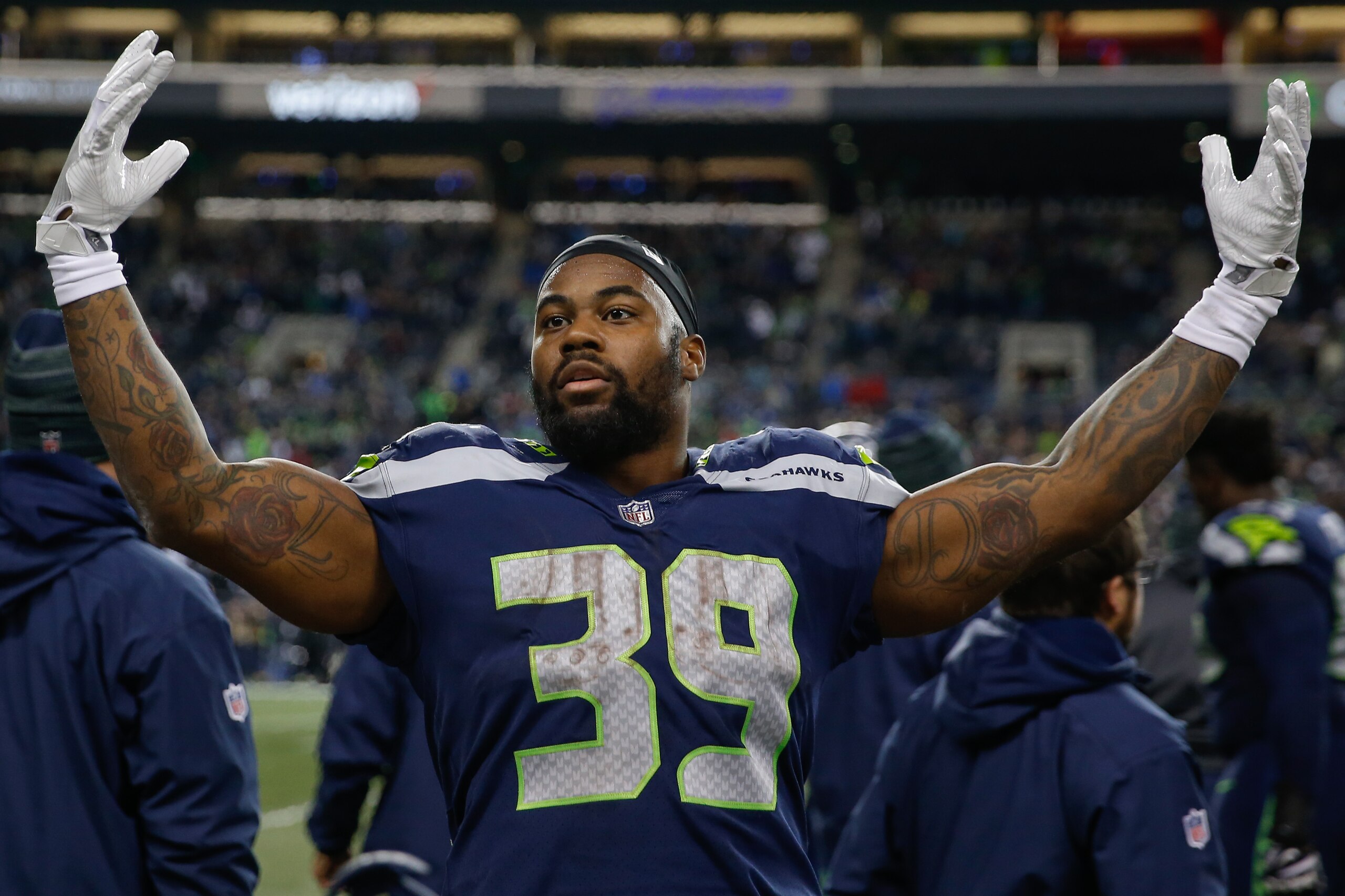 SEATTLE, WA - DECEMBER 03:  Running back Mike Davis #39 of the Seattle Seahawks celebrates on the sidelines as time runs out against the Philadelphia Eagles at CenturyLink Field on December 3, 2017 in Seattle, Washington. The Seahawks beat the Eagles 24-1