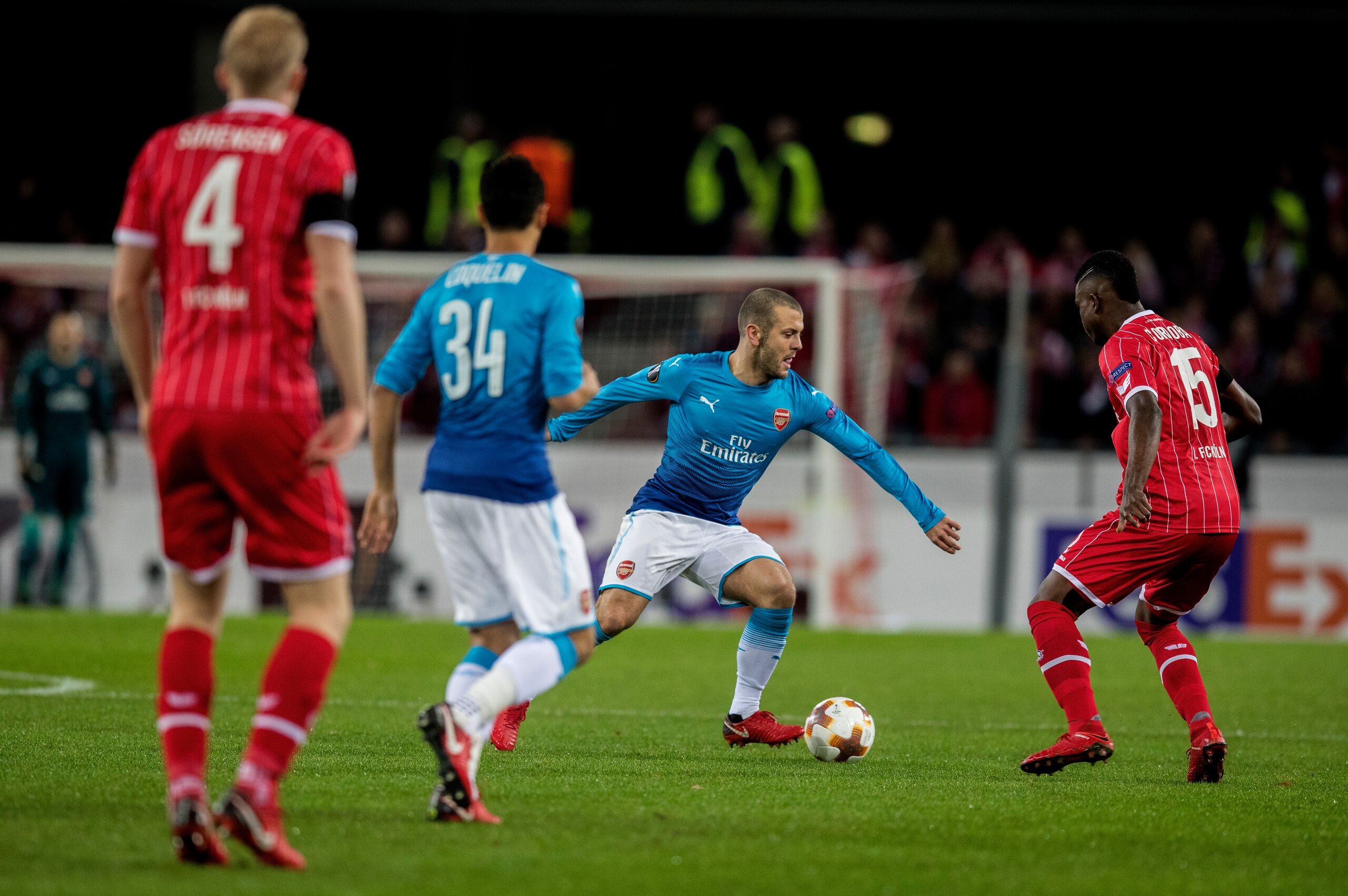 COLOGNE, GERMANY - NOVEMBER 23:  Jack Wilshere of Arsenal  is challenged by Jhon Cordoba of 1.FC Koeln during the UEFA Europa League group H match between 1. FC Koeln and Arsenal FC at RheinEnergieStadion on November 23, 2017 in Cologne, Germany.  (Photo 