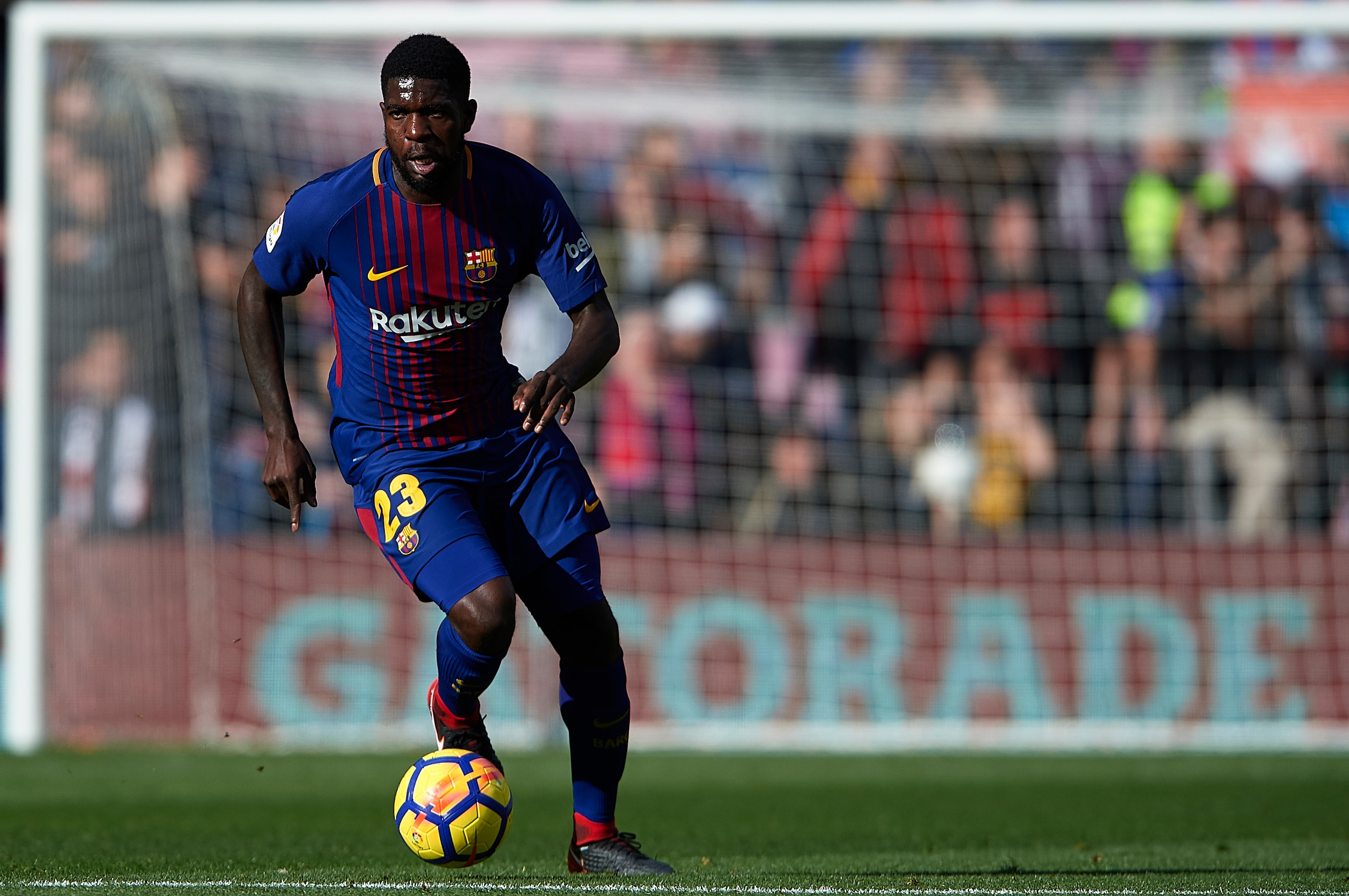 BARCELONA, SPAIN - DECEMBER 02:  Samuel Umtiti of Barcelona runs with the ball during the La Liga match between Barcelona and Celta de Vigo at Camp Nou on December 2, 2017 in Barcelona, Spain.  (Photo by Manuel Queimadelos Alonso/Getty Images)