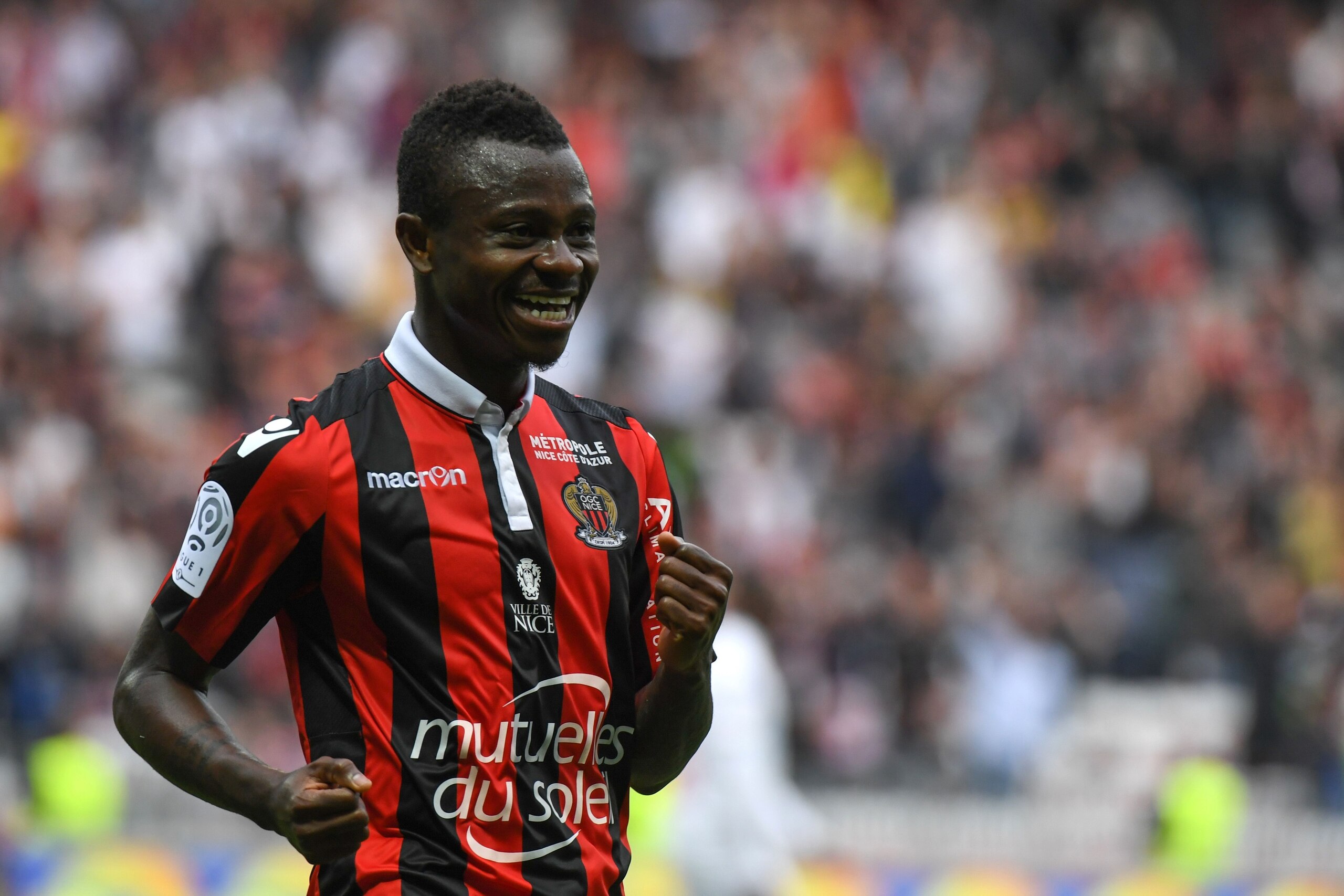 Nice's Ivorian midfielder Jean Michael Seri celebrates after scoring a goal during the French L1 Football match between OGC Nice and AS Nancy Lorraine at the Allianz Riviera Stadium, in Nice, on April 15, 2017. / AFP PHOTO / Yann COATSALIOU        (Photo 