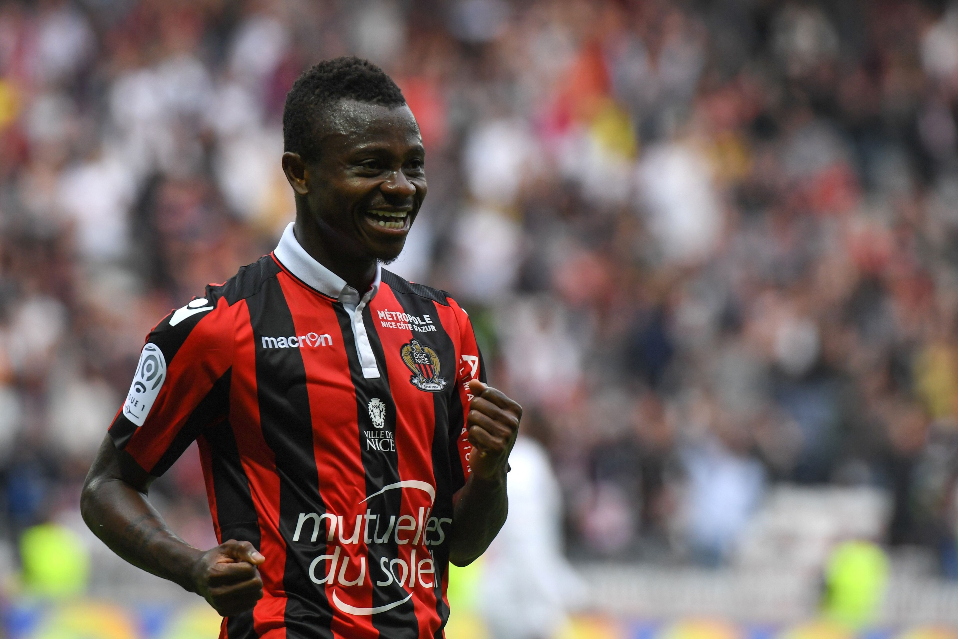 Nice's Ivorian midfielder Jean Michael Seri celebrates after scoring a goal during the French L1 Football match between OGC Nice and AS Nancy Lorraine at the Allianz Riviera Stadium, in Nice, on April 15, 2017. / AFP PHOTO / Yann COATSALIOU        (Photo 