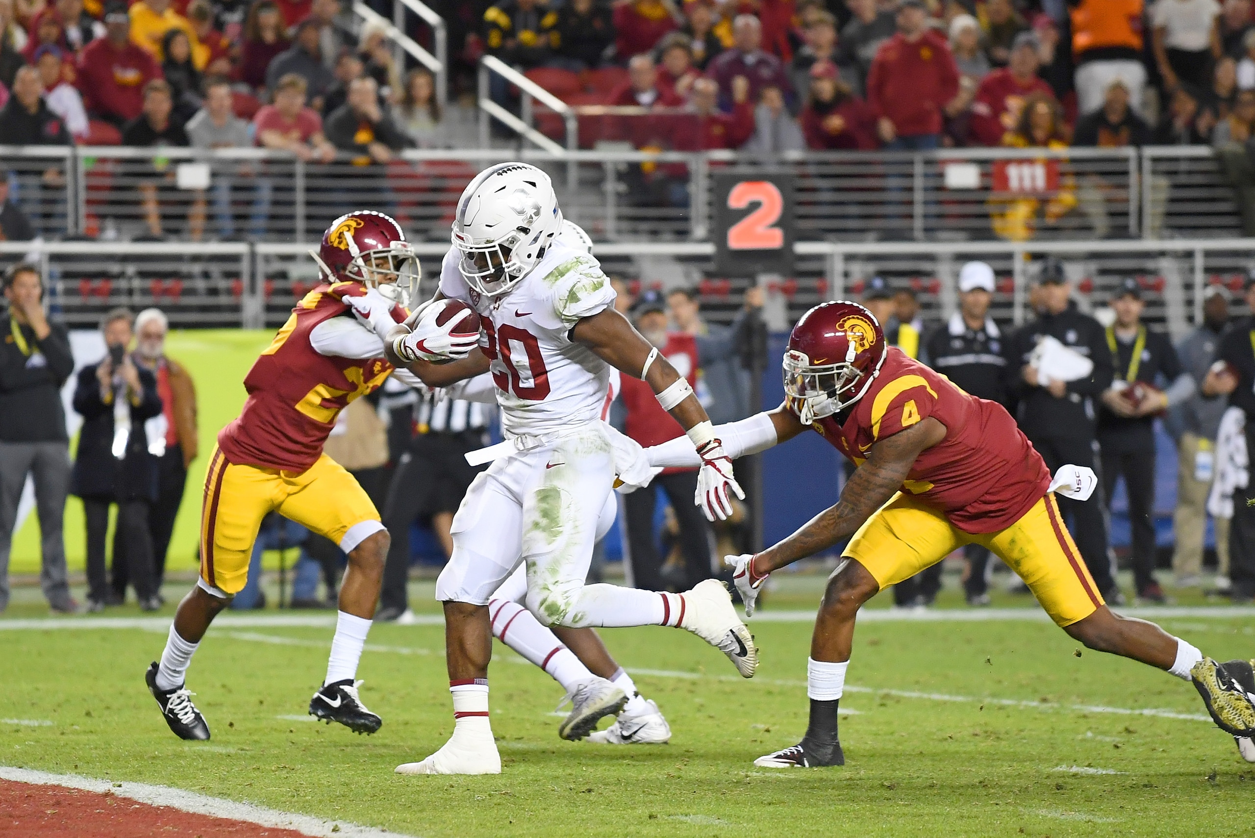 SANTA CLARA, CA - DECEMBER 01:  Bryce Love #20 of the Stanford Cardinal scores on a 9-yard touchdown run against the USC Trojans during the Pac-12 Football Championship Game at Levi's Stadium on December 1, 2017 in Santa Clara, California.  (Photo by Thea
