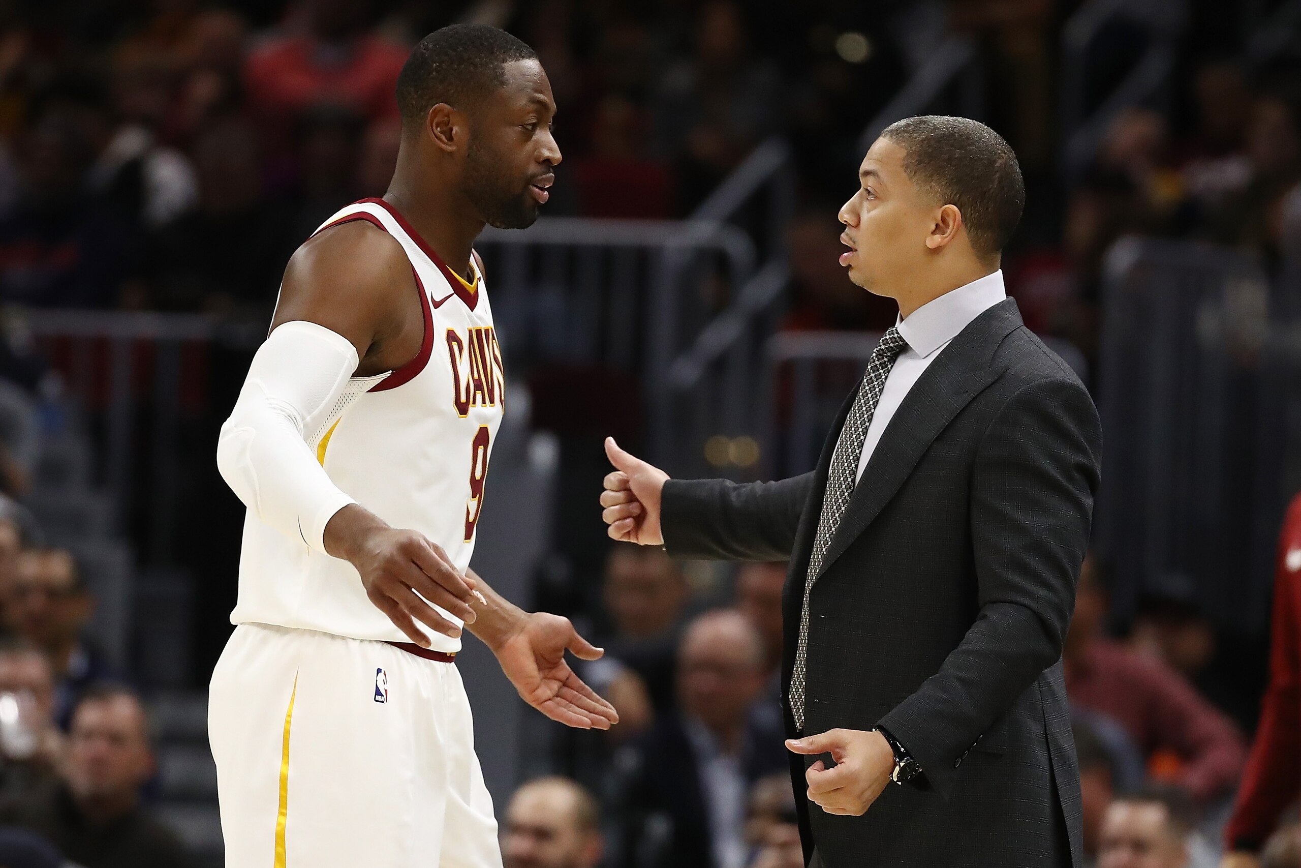 CLEVELAND, OH - NOVEMBER 07:  Head coach Tyronn Lue of the Cleveland Cavaliers talks to Dwyane Wade #9 while playing the Milwaukee Bucks at Quicken Loans Arena on November 7, 2017 in Cleveland, Ohio. Cleveland won the game 124-119. NOTE TO USER: User expr