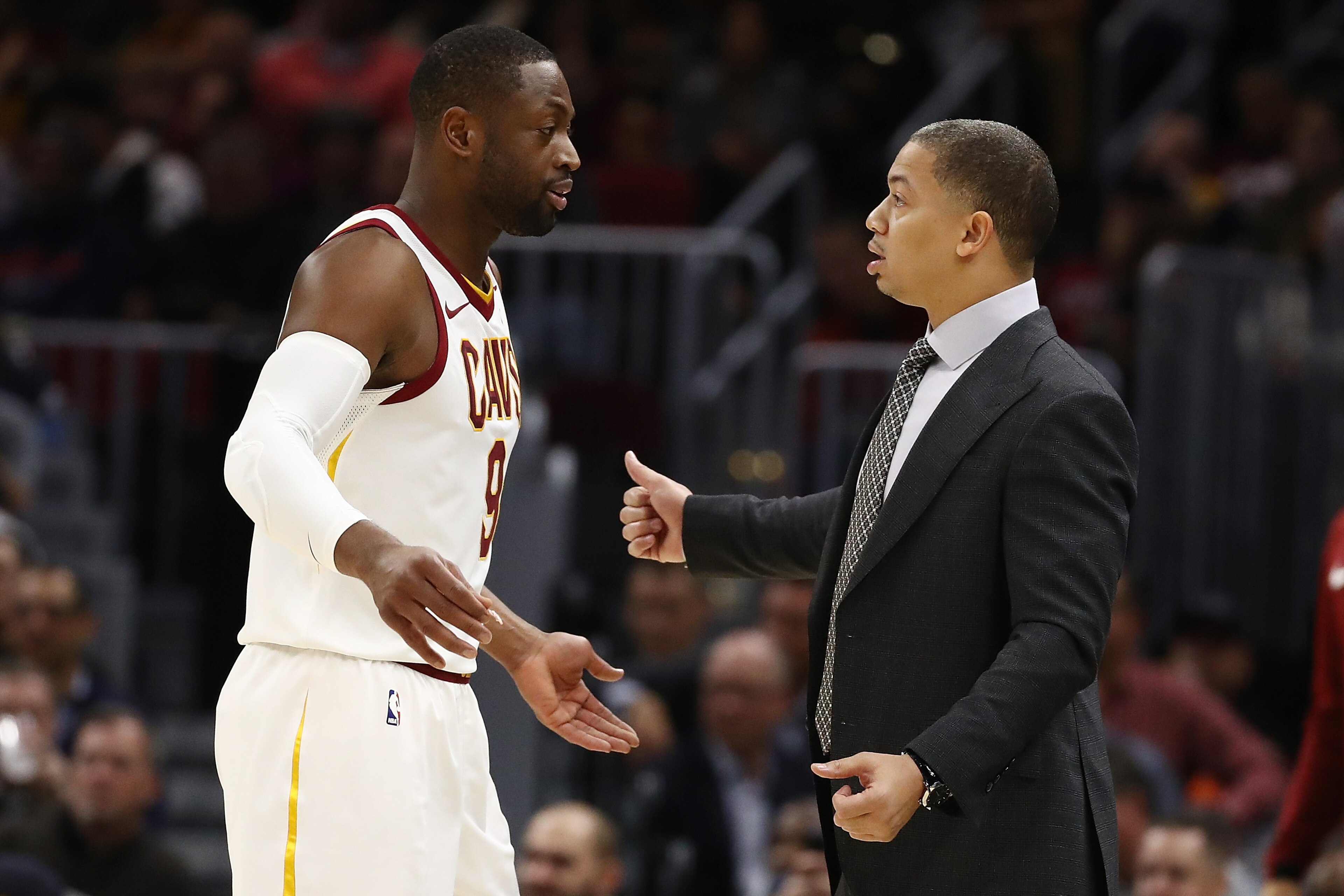 CLEVELAND, OH - NOVEMBER 07:  Head coach Tyronn Lue of the Cleveland Cavaliers talks to Dwyane Wade #9 while playing the Milwaukee Bucks at Quicken Loans Arena on November 7, 2017 in Cleveland, Ohio. Cleveland won the game 124-119. NOTE TO USER: User expr
