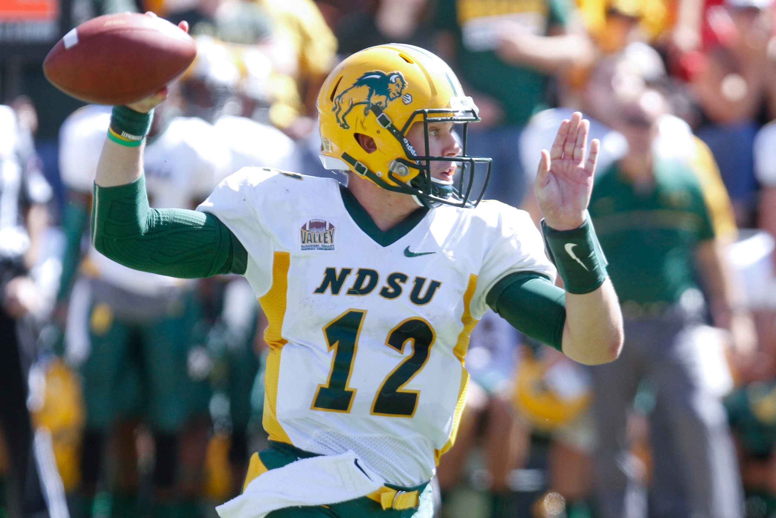 IOWA CITY, IOWA- SEPTEMBER 17:  Quarterback Easton Stick #12 of the North Dakota State Bison drops back for a pass in the second quarter against the Iowa Hawkeyes, on September 17, 2016 at Kinnick Stadium in Iowa City, Iowa.  (Photo by Matthew Holst/Getty