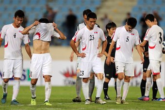 North Korea's players react after loosing an Asian Cup 2019 qualifier football match between Lebanon and North Korea at the sports city stadium in Beirut on October 10, 2017.
Lebanon won 5 -0.  / AFP PHOTO / STRINGER        (Photo credit should read STRIN
