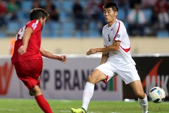 Lebanon's Ali Hamam vies for the ball against North Korea's Kim Chol Bom during an Asian Cup 2019 qualifier football match between Lebanon and North Korea at the sports city stadium in Beirut on October 10, 2017.
Lebanon won 5 -0.  / AFP PHOTO / STRINGER 