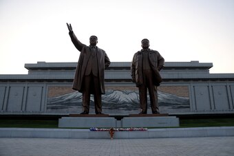 Statues of Kim Il Sung and his son on Mansu Hill