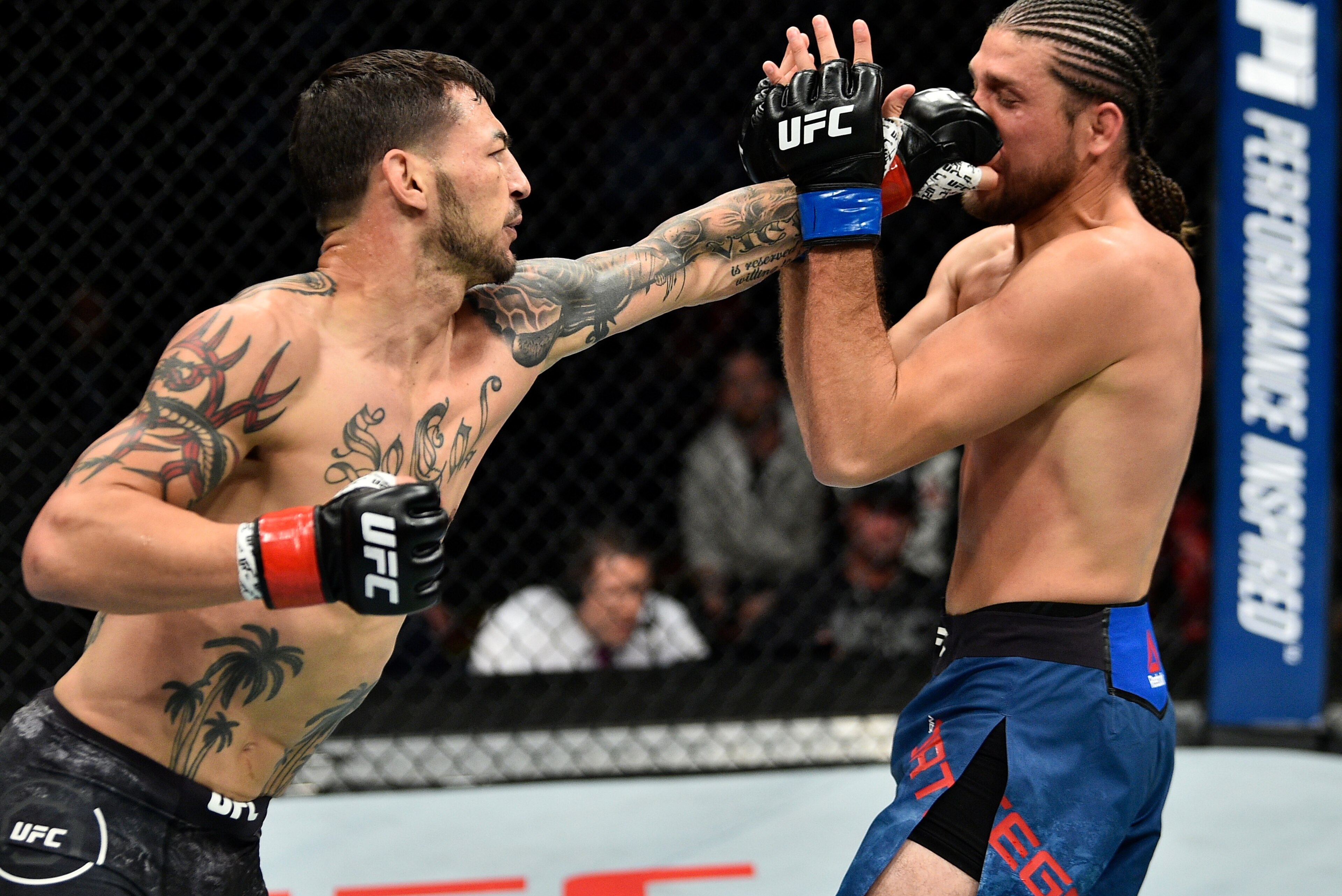 FRESNO, CA - DECEMBER 09: (L-R) Cub Swanson punches Brian Ortega in their featherweight bout during the UFC Fight Night event inside Save Mart Center on December 9, 2017 in Fresno, California. (Photo by Jeff Bottari/Zuffa LLC/Zuffa LLC via Getty Images) FRESNO, CA - DECEMBER 09: (L-R) Cub Swanson punches Brian Ortega in their featherweight bout during the UFC Fight Night event inside Save Mart Center on December 9, 2017 in Fresno, California. (Photo by Jeff Bottari/Zuffa LLC/Zuffa LLC via Getty Images)