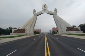 The Arch of Reunification dominates the skyline on the drive into Pyongyang.