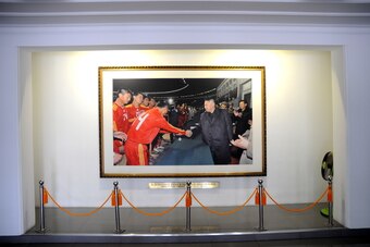 A photo of Kim Jong Un shaking hands with the players has pride of place at the Pyongyang International Football School.