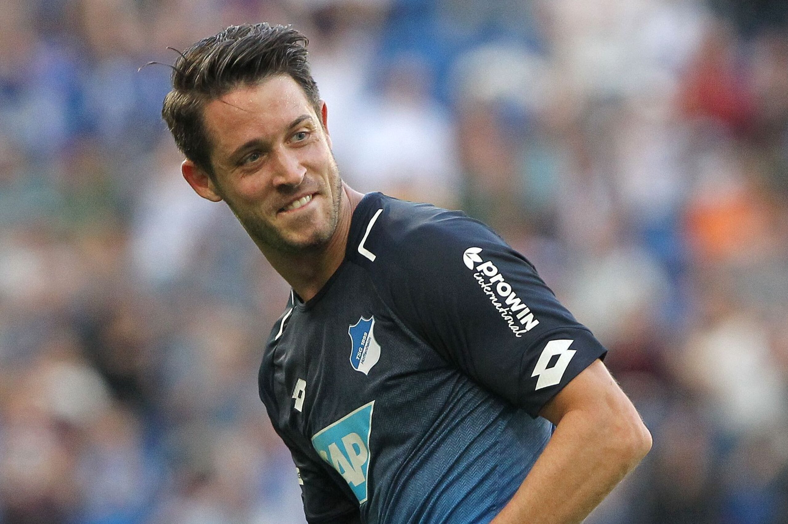 Hoffenheim's German forward Mark Uth celebrates after scoring the 2-1 during the German First division Bundesliga football match TSG 1899 Hoffenheim vs FC Augsburg in Sinsheim, southwestern Germany, on October 14, 2017. / AFP PHOTO / Amelie QUERFURTH / RE Hoffenheim's German forward Mark Uth celebrates after scoring the 2-1 during the German First division Bundesliga football match TSG 1899 Hoffenheim vs FC Augsburg in Sinsheim, southwestern Germany, on October 14, 2017. / AFP PHOTO / Amelie QUERFURTH / RE