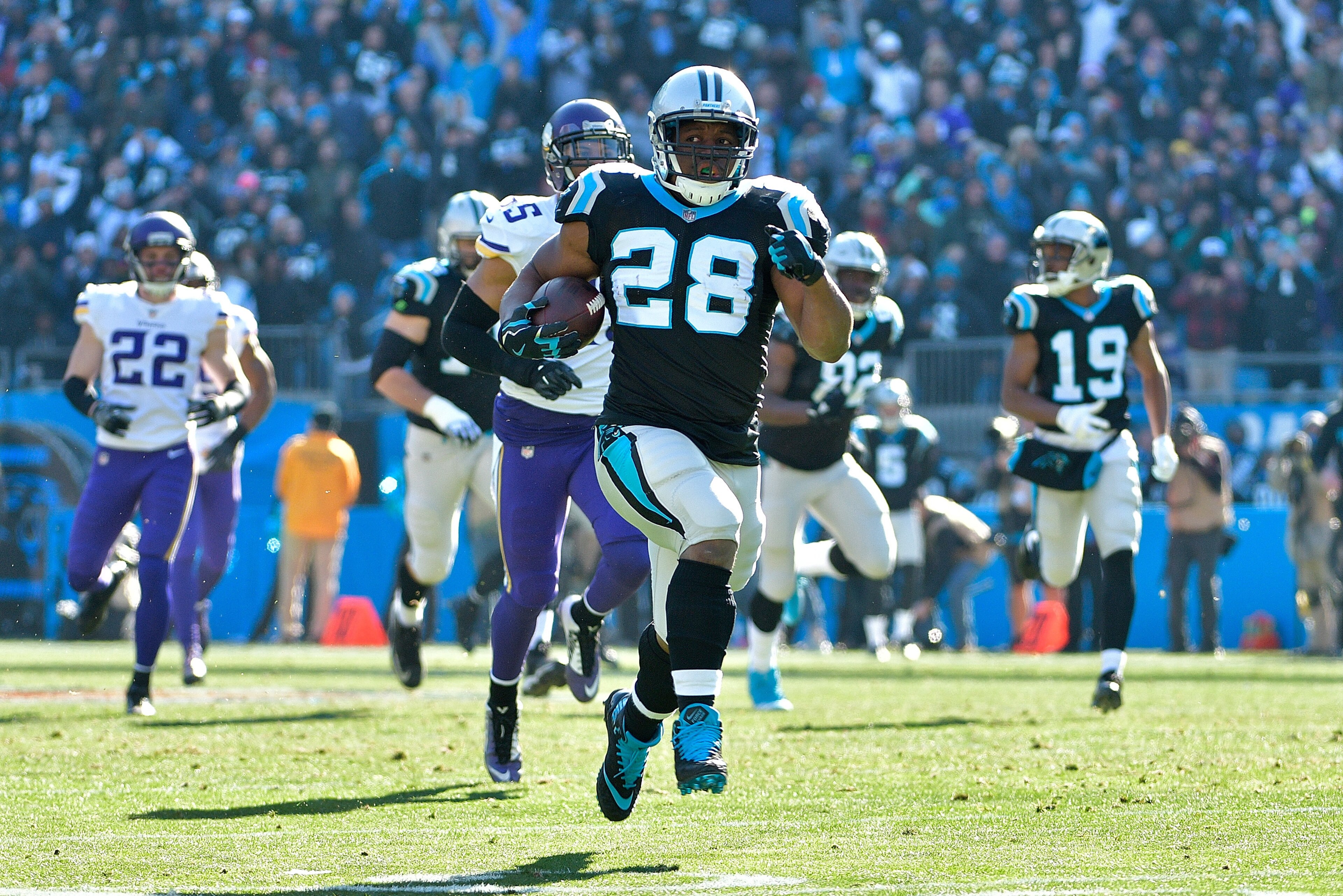CHARLOTTE, NC - DECEMBER 10:  Jonathan Stewart #28 of the Carolina Panthers runs for a touchdown against the Minnesota Vikings in the first quarter during their game at Bank of America Stadium on December 10, 2017 in Charlotte, North Carolina.  (Photo by 
