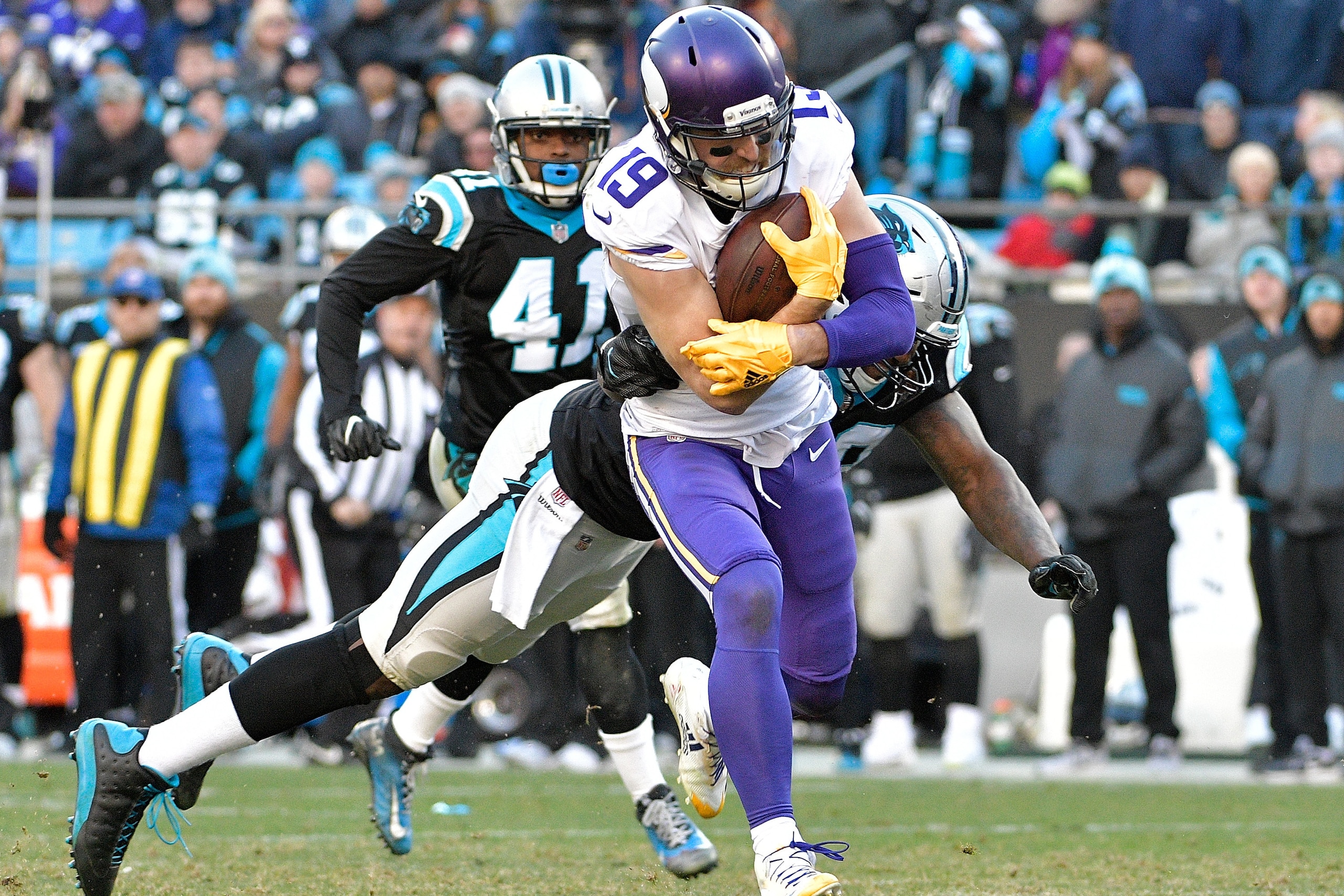 CHARLOTTE, NC - DECEMBER 10:  Adam Thielen #19 of the Minnesota Vikings breaks away from Thomas Davis #58 of the Carolina Panthers for a touchdown duering the fourth quarter of their game at Bank of America Stadium on December 10, 2017 in Charlotte, North