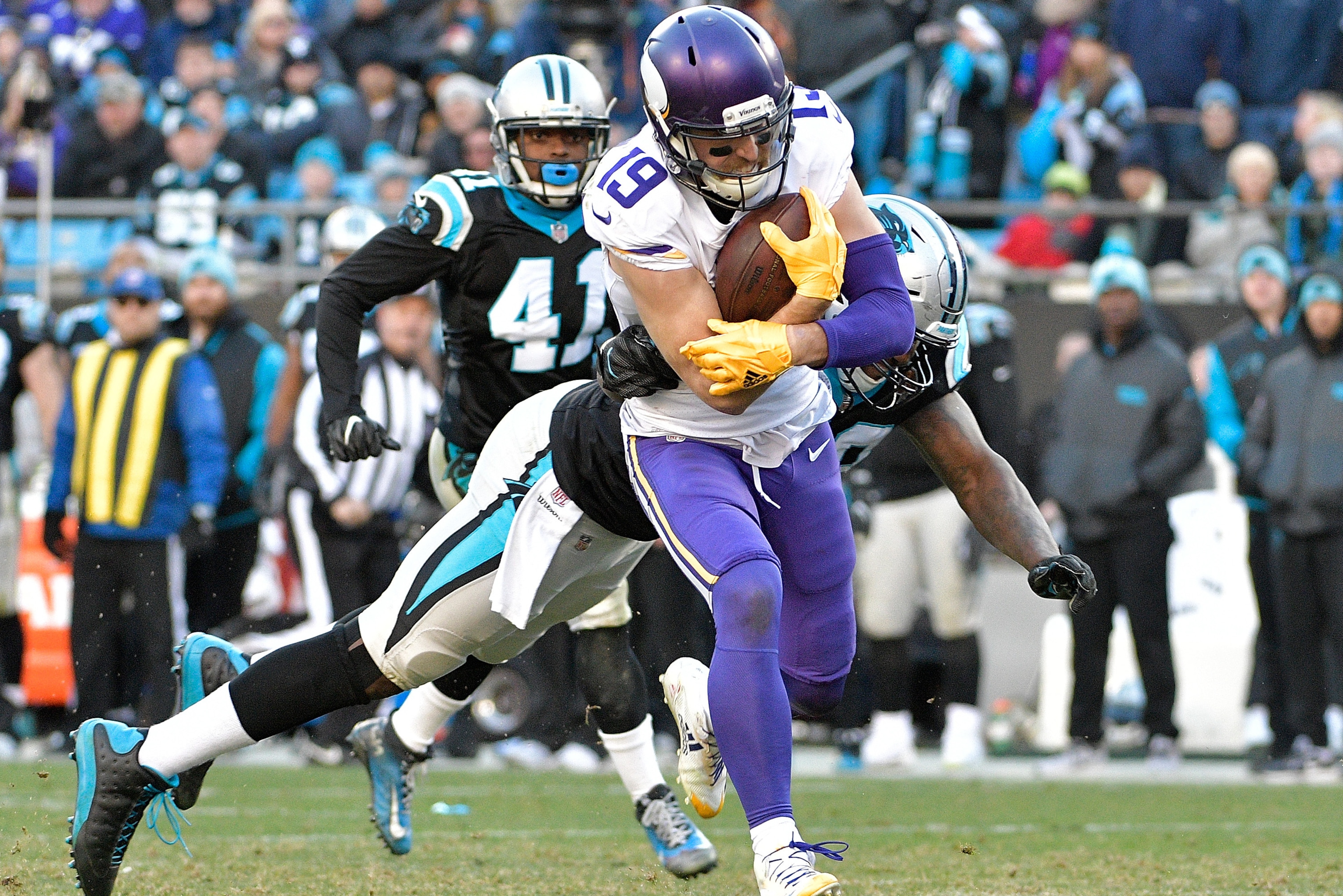 CHARLOTTE, NC - DECEMBER 10:  Adam Thielen #19 of the Minnesota Vikings breaks away from Thomas Davis #58 of the Carolina Panthers for a touchdown duering the fourth quarter of their game at Bank of America Stadium on December 10, 2017 in Charlotte, North