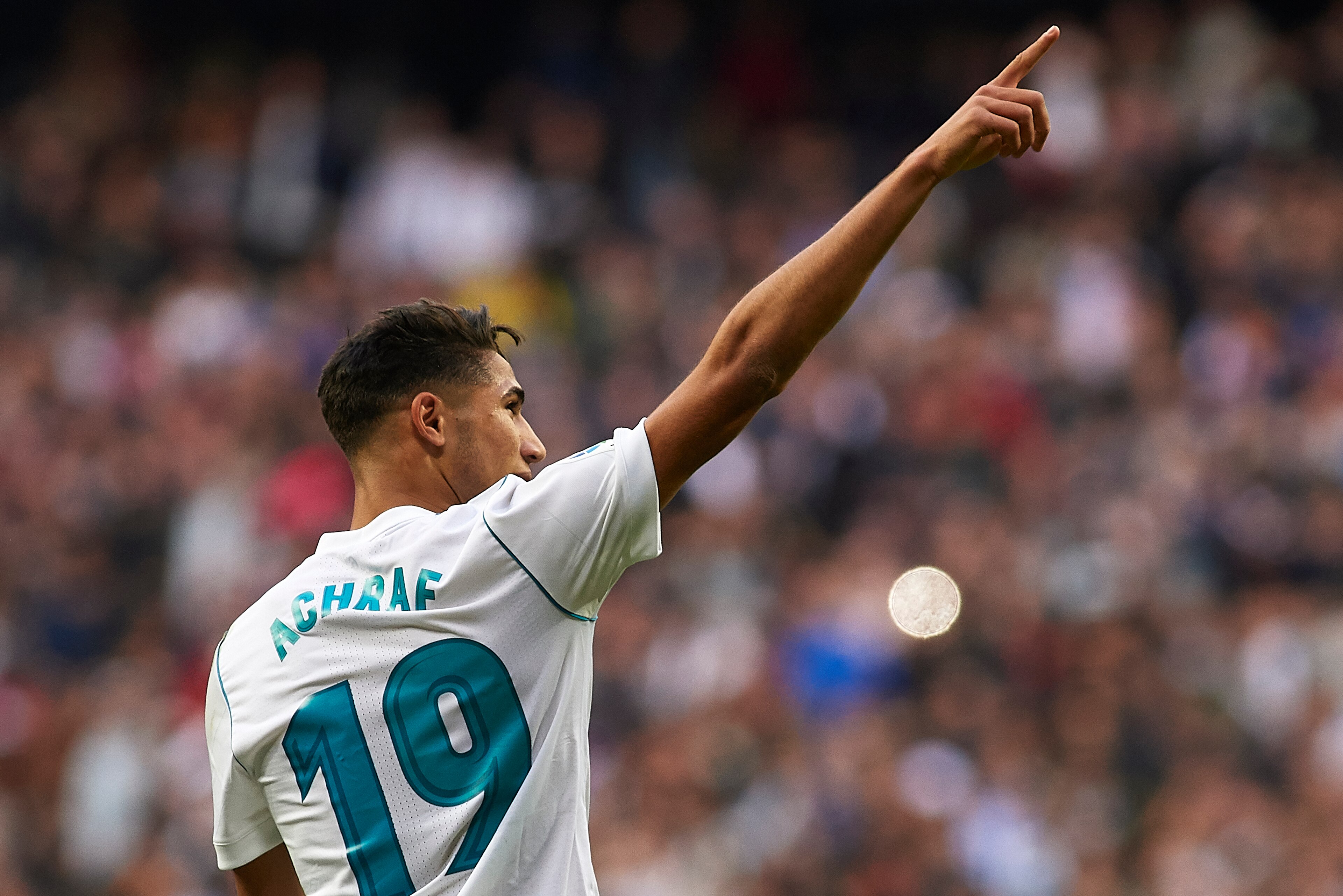 MADRID, SPAIN - DECEMBER 09: Achraf Hakimi of Real Madrid celebrates scoring his team's fifth goal during the La Liga match between Real Madrid and Sevilla at Estadio Santiago Bernabeu on December 9, 2017 in Madrid, Spain. (Photo by fotopress/Getty Imag MADRID, SPAIN - DECEMBER 09: Achraf Hakimi of Real Madrid celebrates scoring his team's fifth goal during the La Liga match between Real Madrid and Sevilla at Estadio Santiago Bernabeu on December 9, 2017 in Madrid, Spain. (Photo by fotopress/Getty Imag