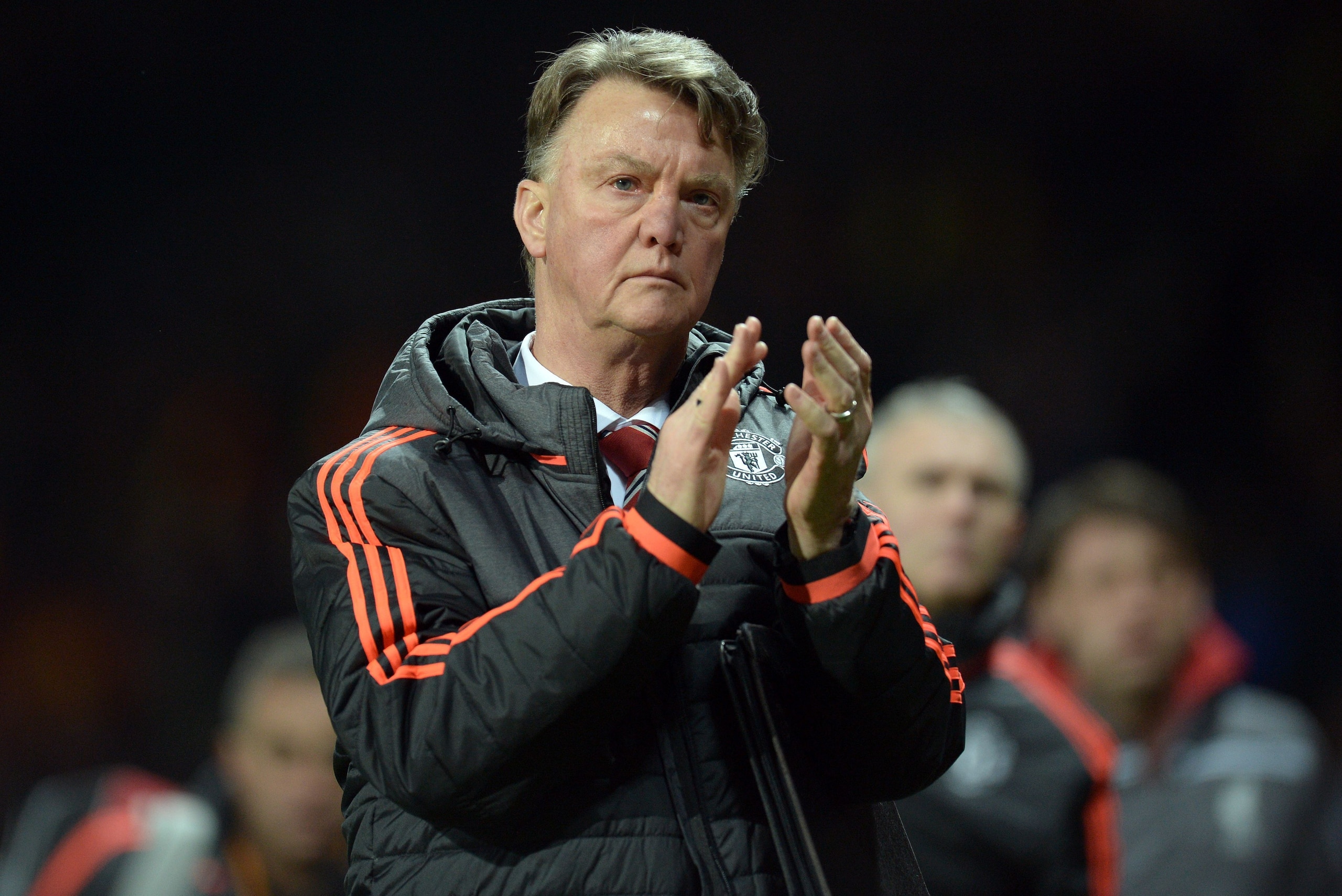 Manchester United's Dutch manager Louis van Gaal applauds supporters after the UEFA Europa League round of 16, second leg football match between Manchester United and Liverpool at Old Trafford in Manchester, north west England on March 17, 2016.
The game 