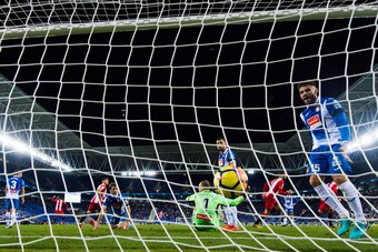 BARCELONA, SPAIN - DECEMBER 11: David Lopez of RCD Espanyol reacrs after David Timor of Girona FC scored the opening goal during the La Liga match between RCD Espanyol and Girona FC at RCDE Stadium on December 11, 2017 in Barcelona, Spain. (Photo by Alex 