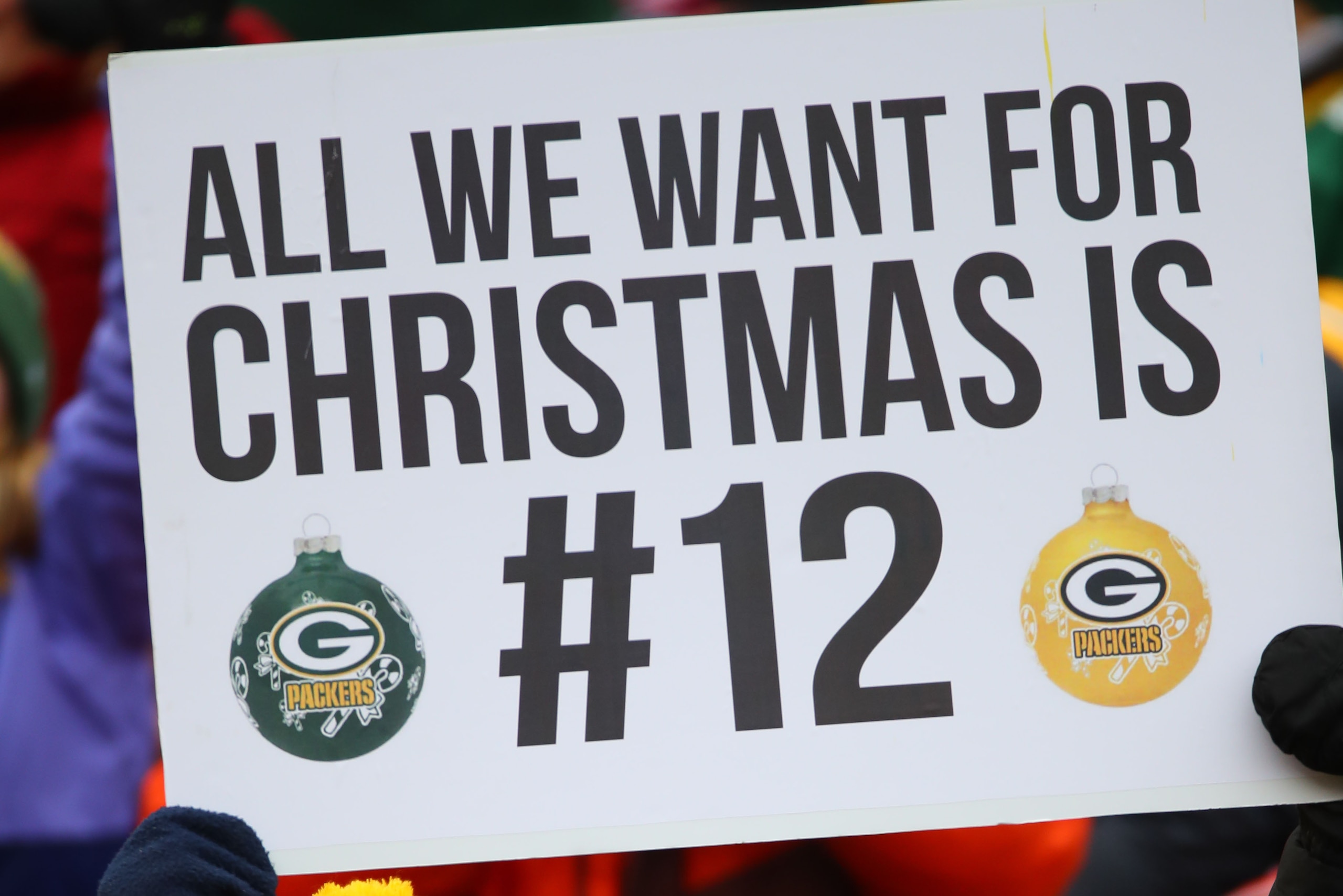 CLEVELAND, OH - DECEMBER 10: Green Bay Packers fans hold a sign referring to injured Packers quarterback Aaron Rodgers during action against the Cleveland Browns at FirstEnergy Stadium on December 10, 2017 in Cleveland, Ohio. (Photo by Gregory Shamus/Gett