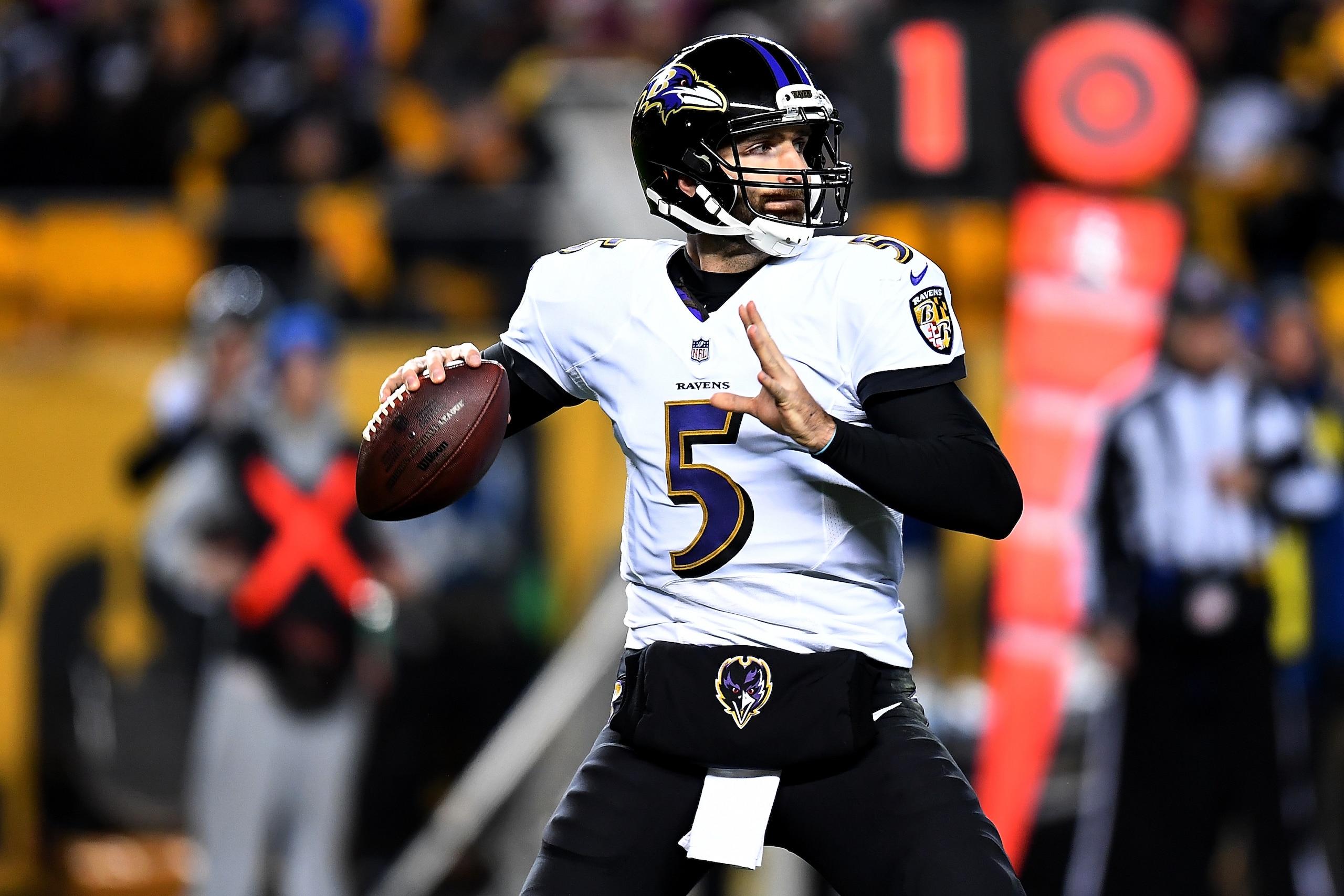 PITTSBURGH, PA - DECEMBER 10: Joe Flacco #5 of the Baltimore Ravens drops back to pass in the second quarter during the game against the Pittsburgh Steelers at Heinz Field on December 10, 2017 in Pittsburgh, Pennsylvania. (Photo by Joe Sargent/Getty Image