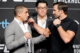 PERTH, AUSTRALIA - DECEMBER 12:  Australia's inaugral UFC champion Robert Whittaker and American contender Luke Rockhold speak at a press conference before a UFC 221 workout session on December 12, 2017 in Perth, Australia.  (Photo by Will Russell/Getty I