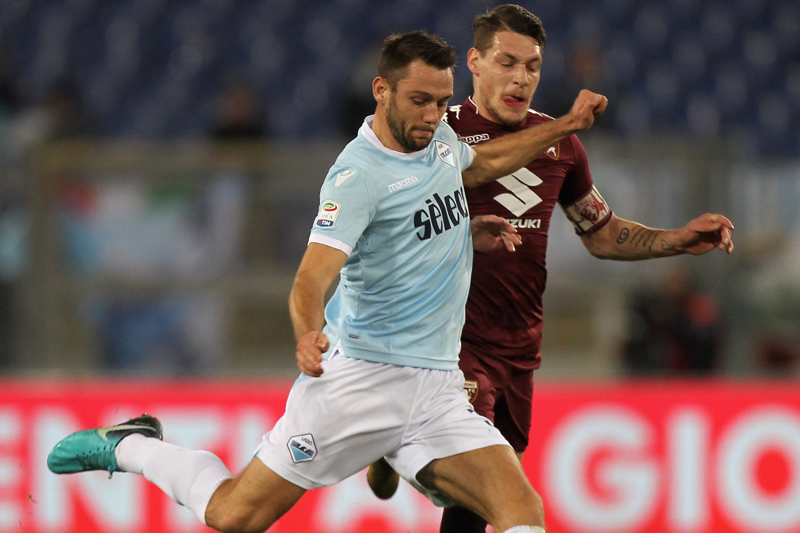 ROME, ITALY - DECEMBER 11:  Stefan De Vrij of SS Lazio competes for the ball with Andrea Belotti of Torino FC during the Serie A match between SS Lazio and Torino FC at Stadio Olimpico on December 11, 2017 in Rome, Italy.  (Photo by Paolo Bruno/Getty Imag