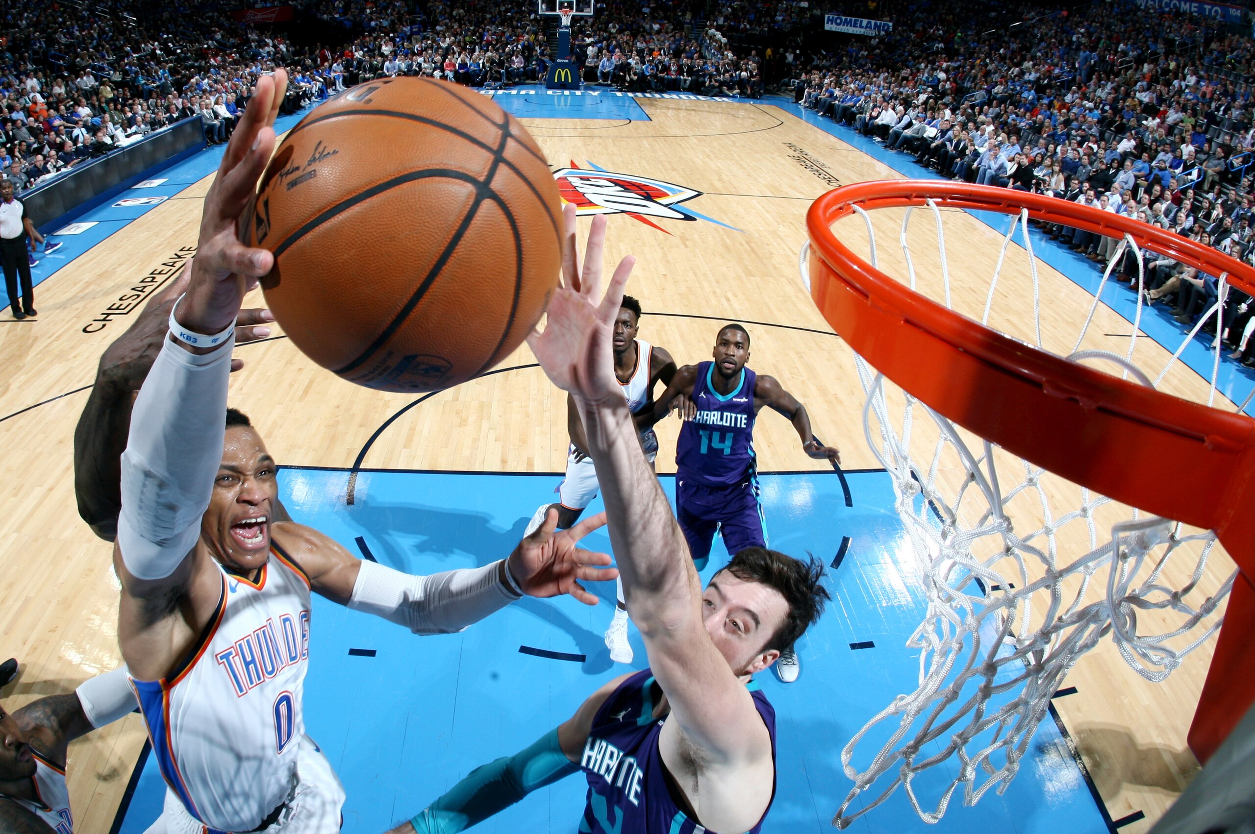 OKLAHOMA CITY, OK - DECEMBER 11: Russell Westbrook #0 of the Oklahoma City Thunder shoots the ball during the game against the Charlotte Hornets on December 11, 2017 at Chesapeake Energy Arena in Oklahoma City, Oklahoma. NOTE TO USER: User expressly ackno