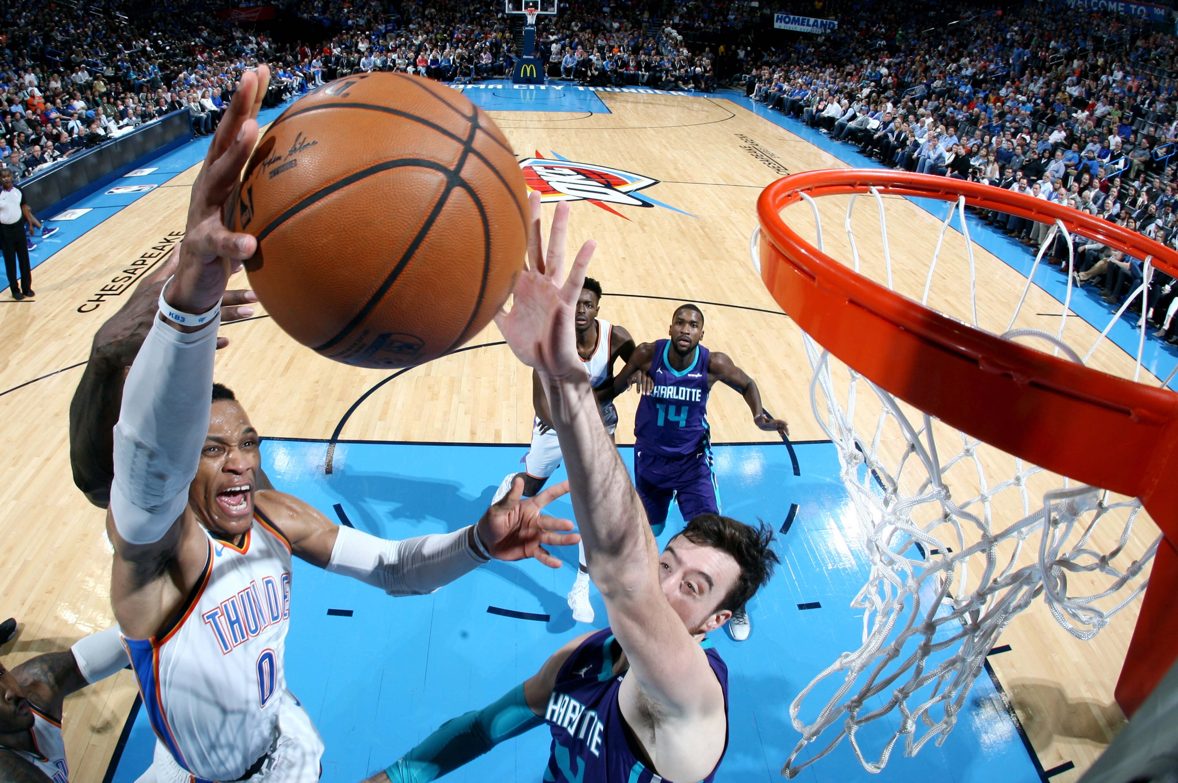 OKLAHOMA CITY, OK - DECEMBER 11: Russell Westbrook #0 of the Oklahoma City Thunder shoots the ball during the game against the Charlotte Hornets on December 11, 2017 at Chesapeake Energy Arena in Oklahoma City, Oklahoma. NOTE TO USER: User expressly ackno