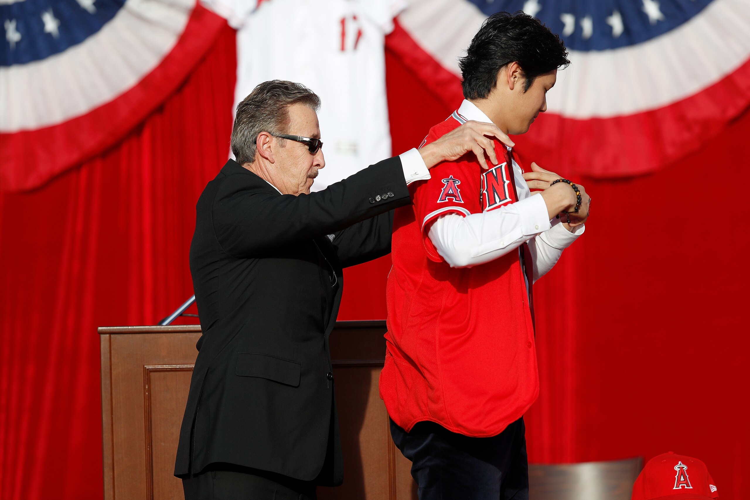 ANAHEIM, CA - DECEMBER 09:  Los Angeles Angels of Anaheim owner Arte Moreno introduces Shohei Ohtani to the Los Angeles Angels of Anaheim at Angel Stadium of Anaheim on December 9, 2017 in Anaheim, California.  (Photo by Josh Lefkowitz/Getty Images)