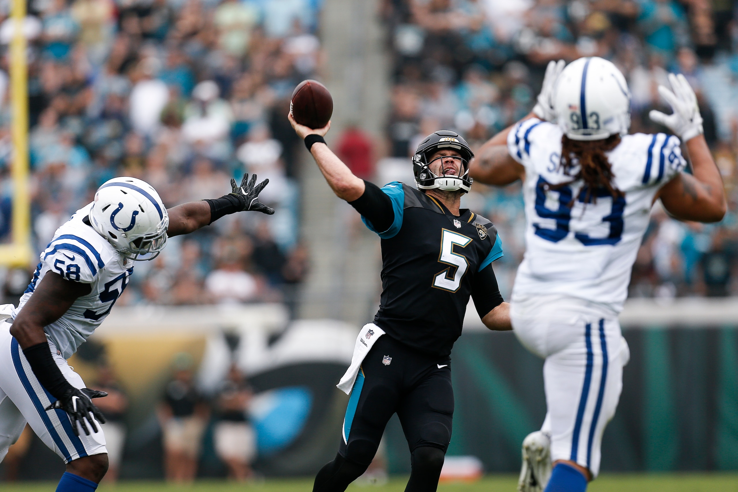 JACKSONVILLE, FL - DECEMBER 3: Quarterback Blake Bortles #5 of the Jacksonville Jaguars is pressured by Linebackers Tarell Basham #58 and Jabaal Sheard #93 of the Indianapolis Colts during the game at EverBank Field on December 3, 2017 in Jacksonville, Fl