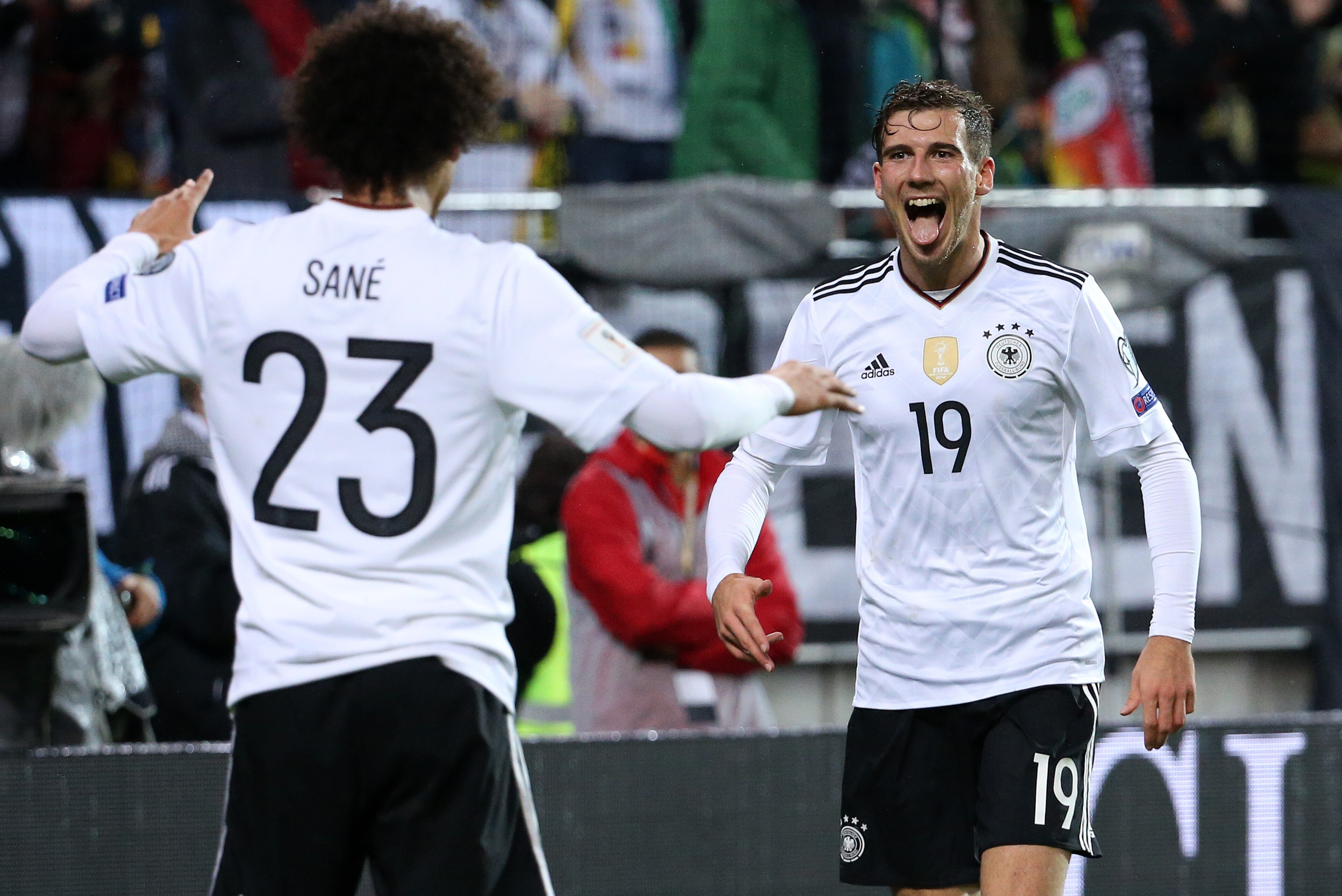 KAISERSLAUTERN, GERMANY - OCTOBER 8: Leon Goretzka of Germany celebrates his second goal with Leroy Sane (left) during the FIFA 2018 World Cup Qualifier between Germany and Azerbaijan at Fritz-Walter Stadium on October 8, 2017 in Kaiserslautern, Germany. KAISERSLAUTERN, GERMANY - OCTOBER 8: Leon Goretzka of Germany celebrates his second goal with Leroy Sane (left) during the FIFA 2018 World Cup Qualifier between Germany and Azerbaijan at Fritz-Walter Stadium on October 8, 2017 in Kaiserslautern, Germany.