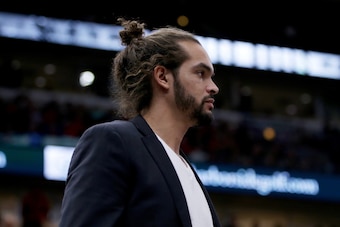 CHICAGO, IL - DECEMBER 09:  Joakim Noah #13 of the New York Knicks looks on from the bench in the third quarter against the Chicago Bulls at the United Center on December 9, 2017 in Chicago, Illinois. NOTE TO USER: User expressly acknowledges and agrees t