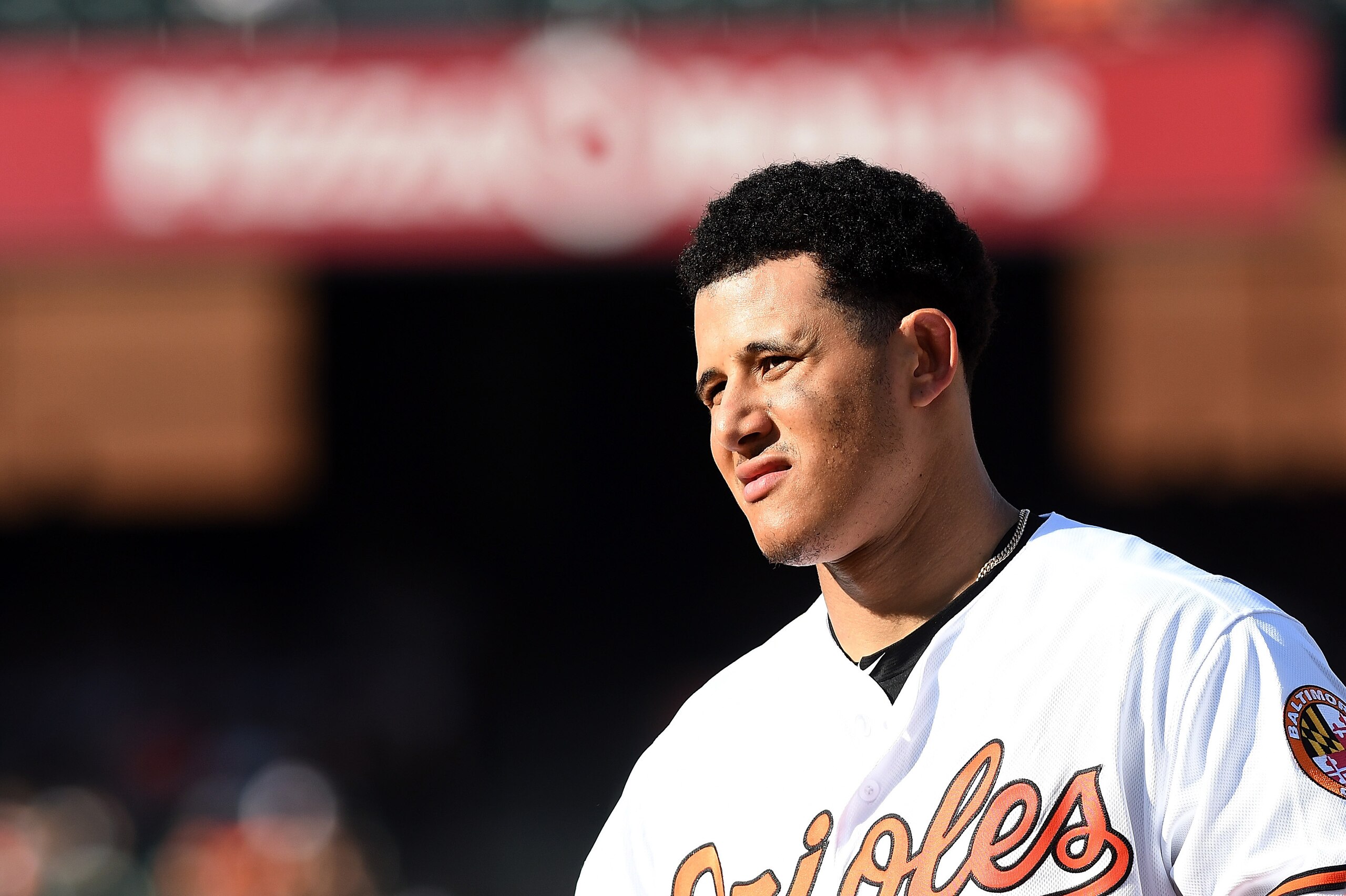BALTIMORE, MD - SEPTEMBER 24:  Manny Machado #13 of the Baltimore Orioles walks to the dugout during the game against the Tampa Bay Rays at Oriole Park at Camden Yards on September 24, 2017 in Baltimore, Maryland.  (Photo by G Fiume/Getty Images)